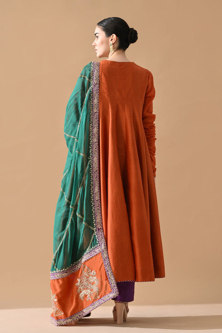 Rust Orange Embroidered Kurta Set with Purple Accents and Green Dupatta