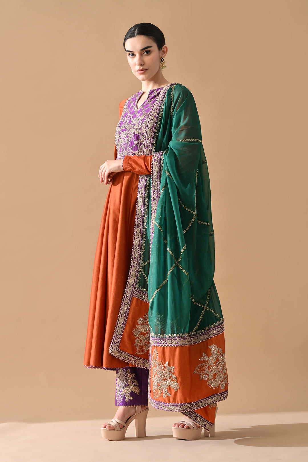 Rust Orange Embroidered Kurta Set with Purple Accents and Green Dupatta