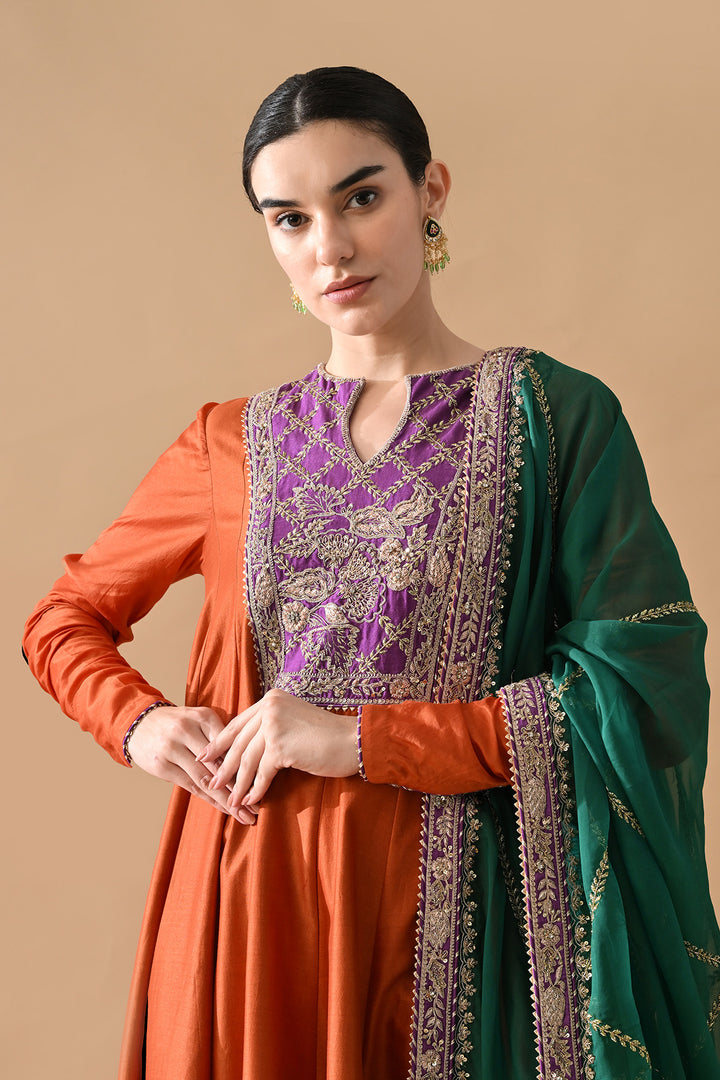Rust Orange Embroidered Kurta Set with Purple Accents and Green Dupatta