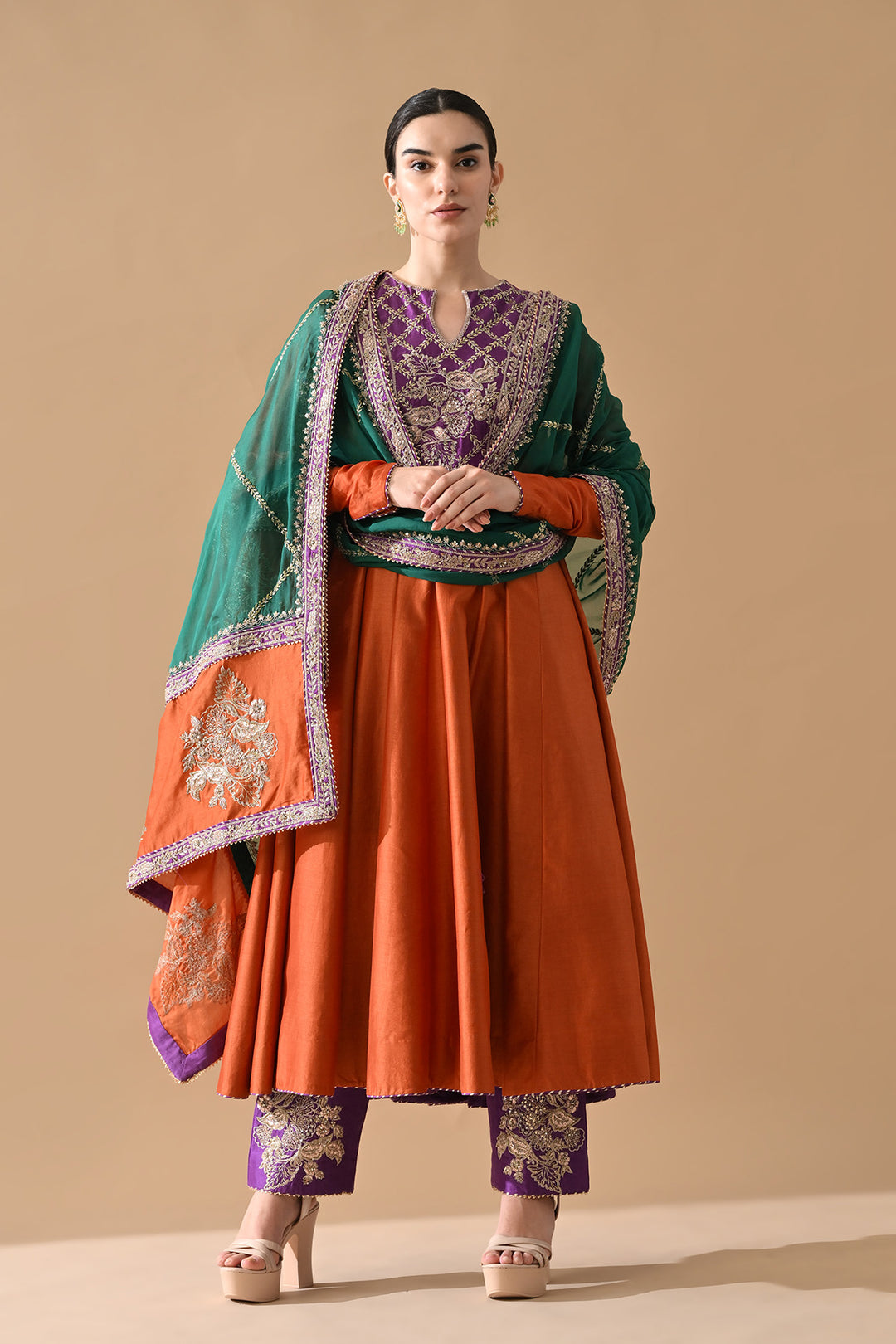 Rust Orange Embroidered Kurta Set with Purple Accents and Green Dupatta