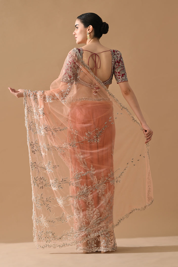 Peach Embroidered Saree with Contrast Blouse
