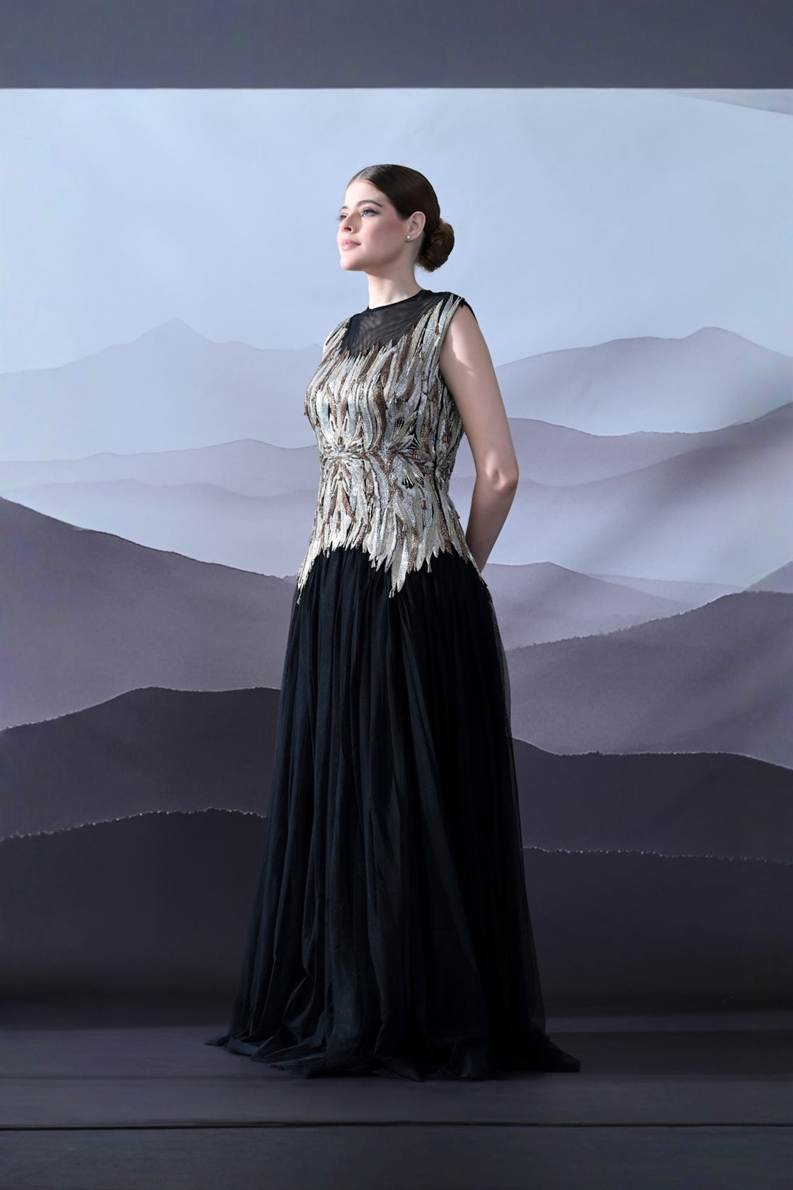 Black Gown With Artisanal Metallic Embroidery And Fluid Draping