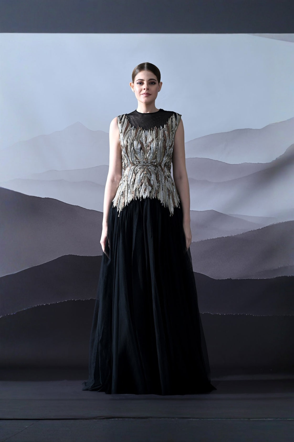 Black Gown With Artisanal Metallic Embroidery And Fluid Draping