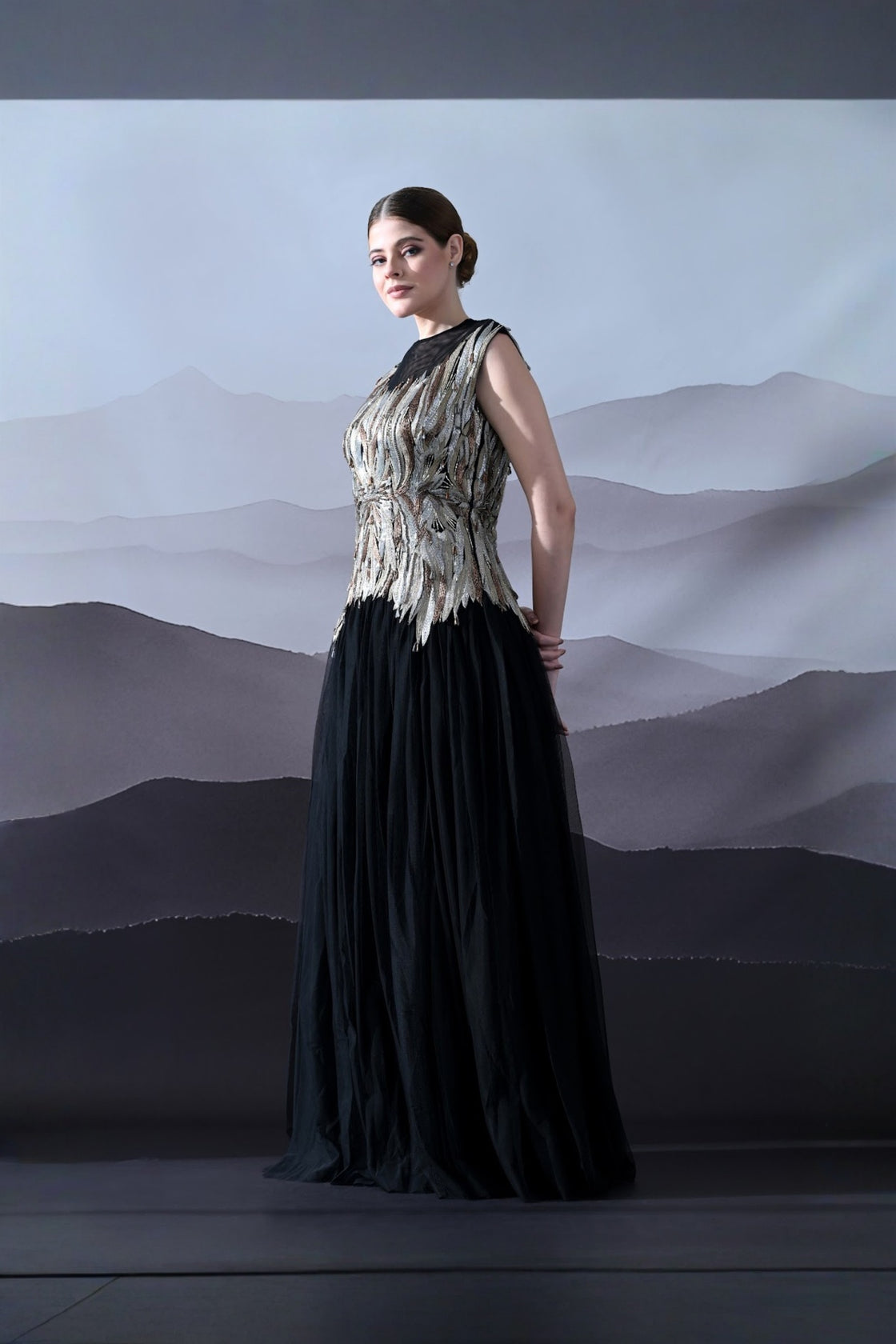 Black Gown With Artisanal Metallic Embroidery And Fluid Draping