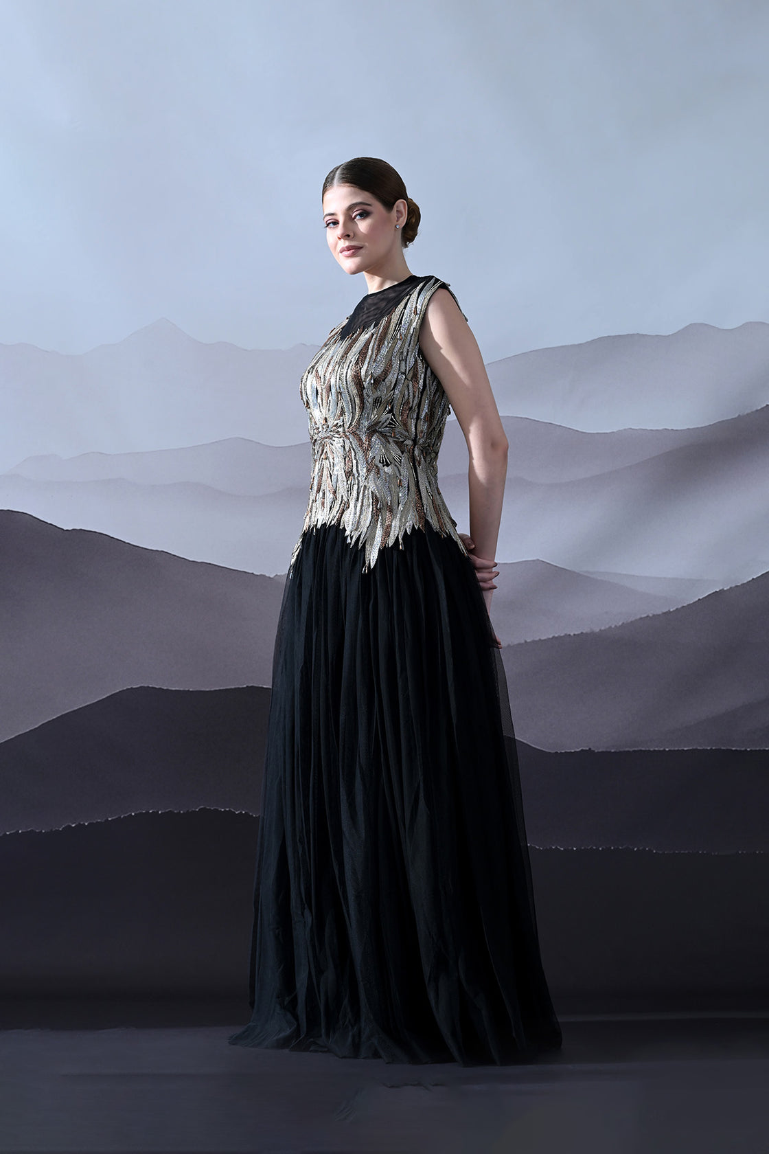Black Gown With Artisanal Metallic Embroidery And Fluid Draping