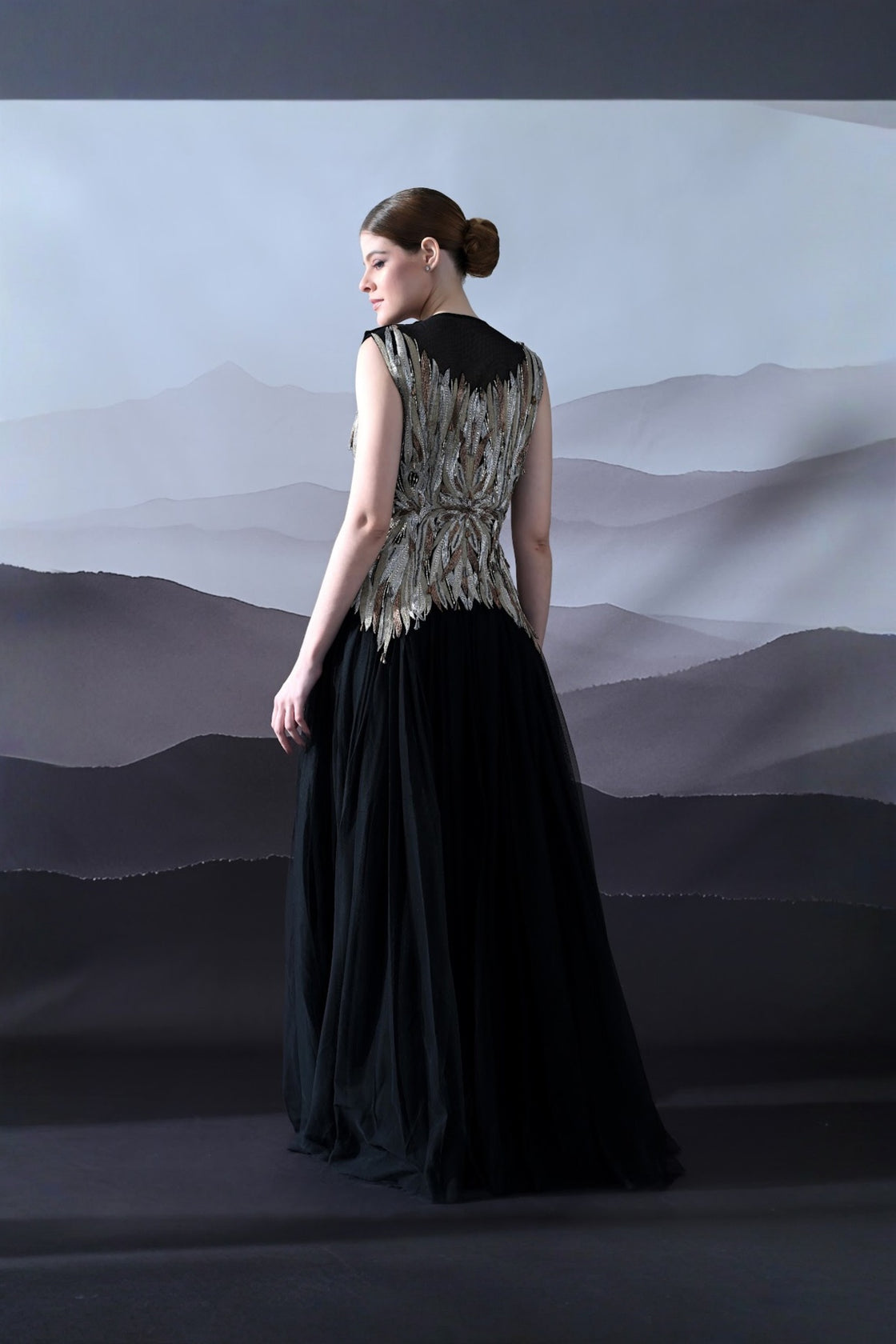 Black Gown With Artisanal Metallic Embroidery And Fluid Draping
