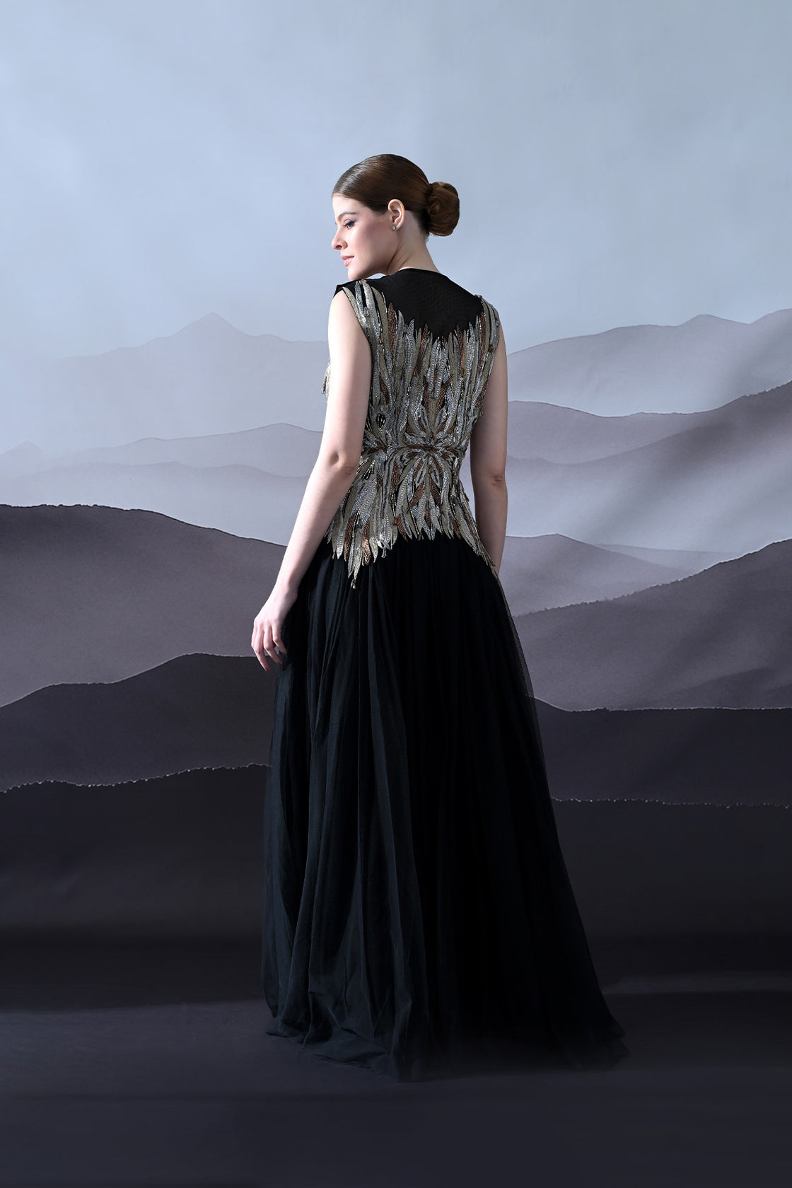 Black Gown With Artisanal Metallic Embroidery And Fluid Draping