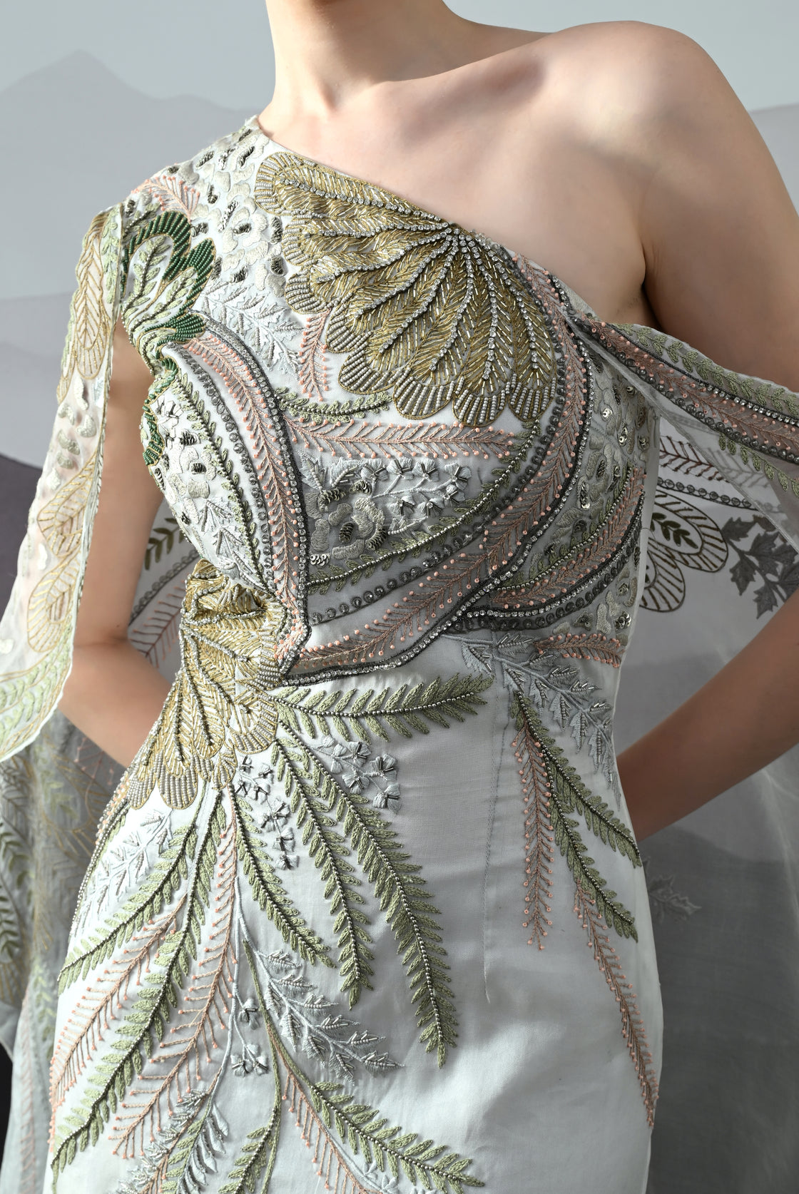 Ivory One-Shoulder Gown with Hand-Embroidered Motifs and Sculpted Draping