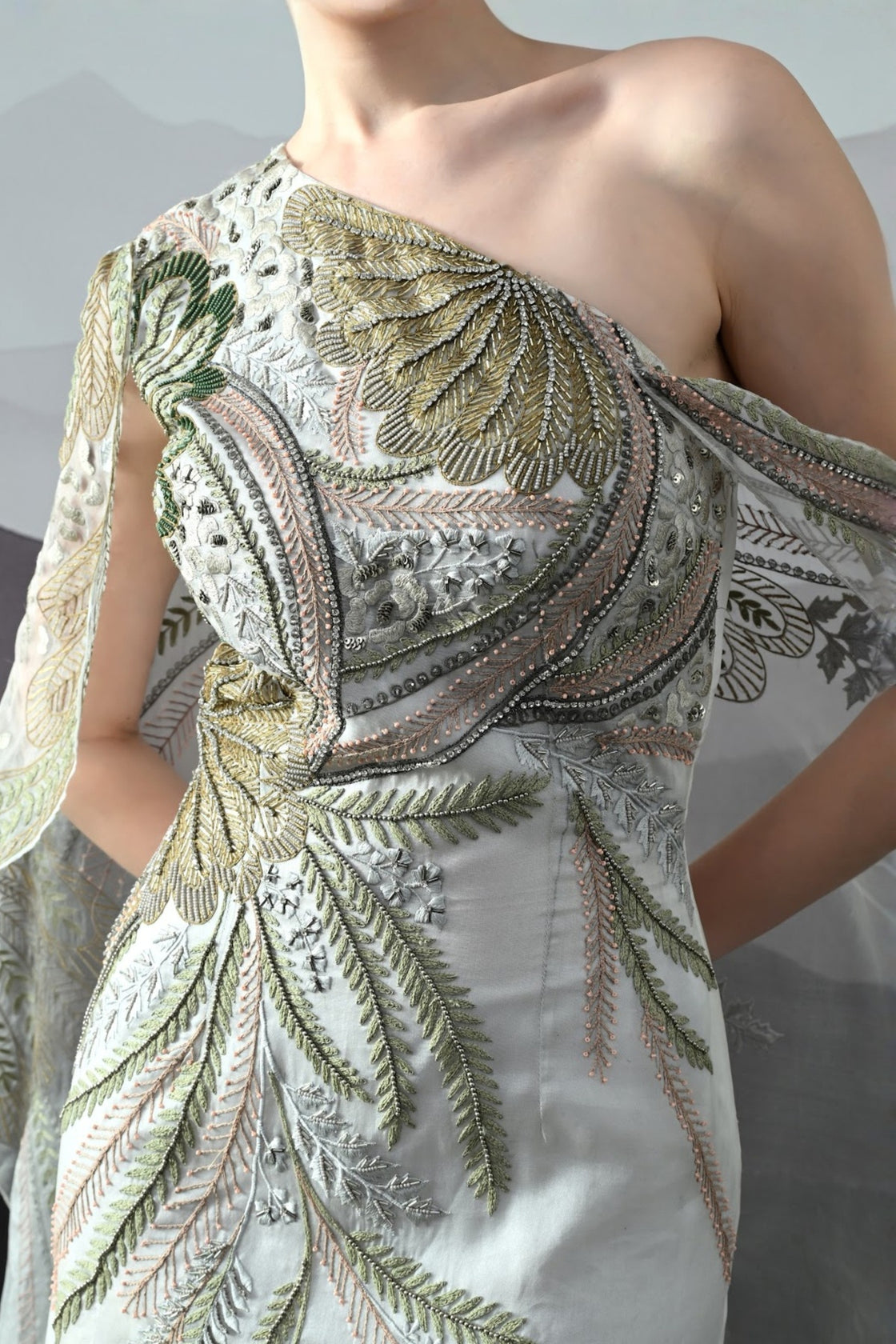 Ivory One-Shoulder Gown With Hand-Embroidered Motifs And Sculpted Draping