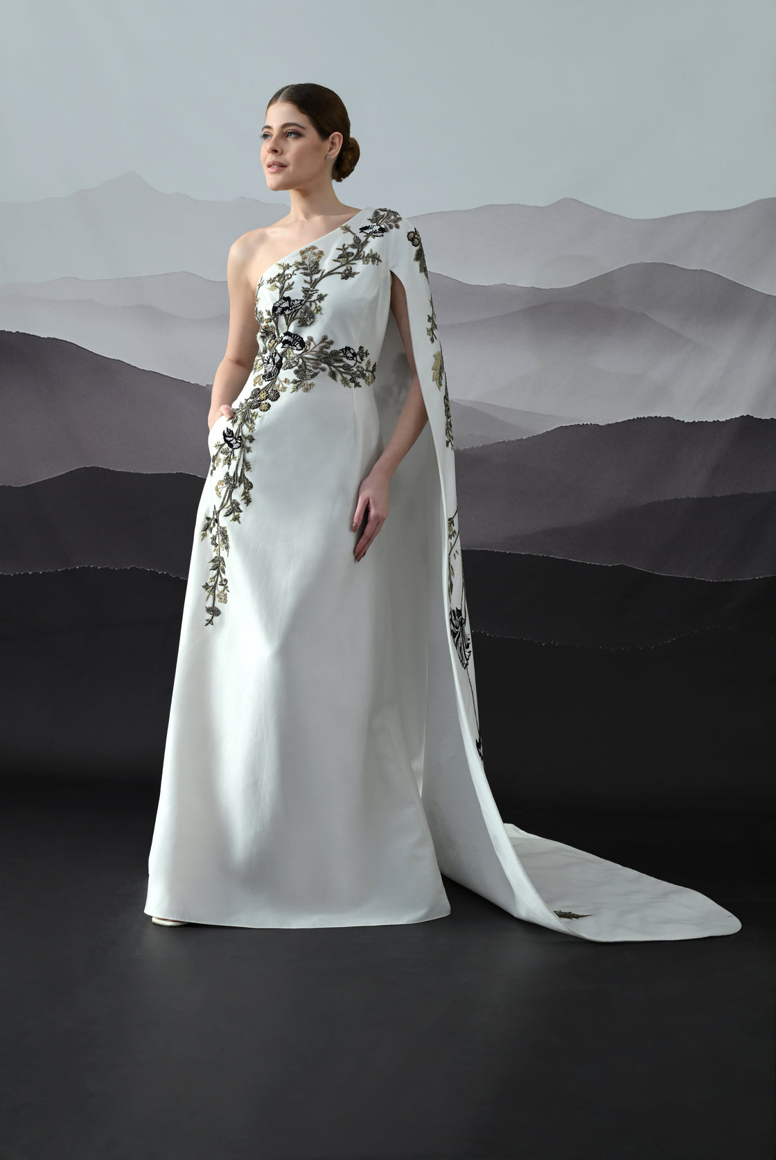Elegant  Gown Featuring a One-Shoulder Bodice with Embroidered Detailing