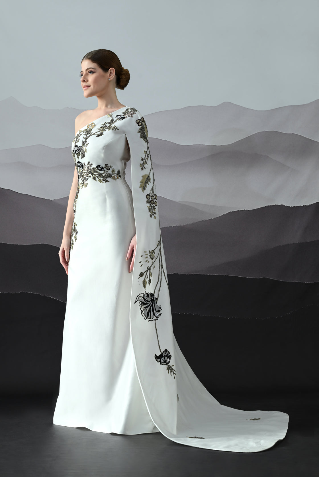 Elegant  Gown Featuring a One-Shoulder Bodice with Embroidered Detailing