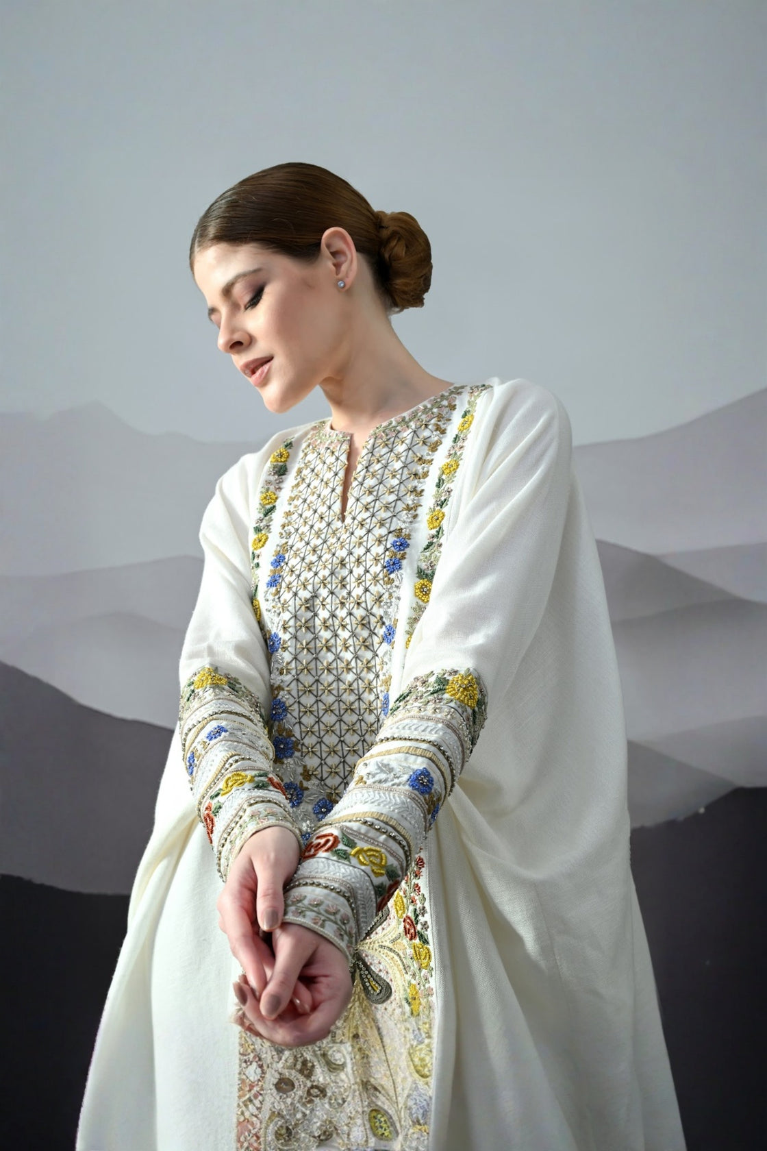 Ivory Kaftan With Hand-Embroidered Floral Work And Geometric Borders