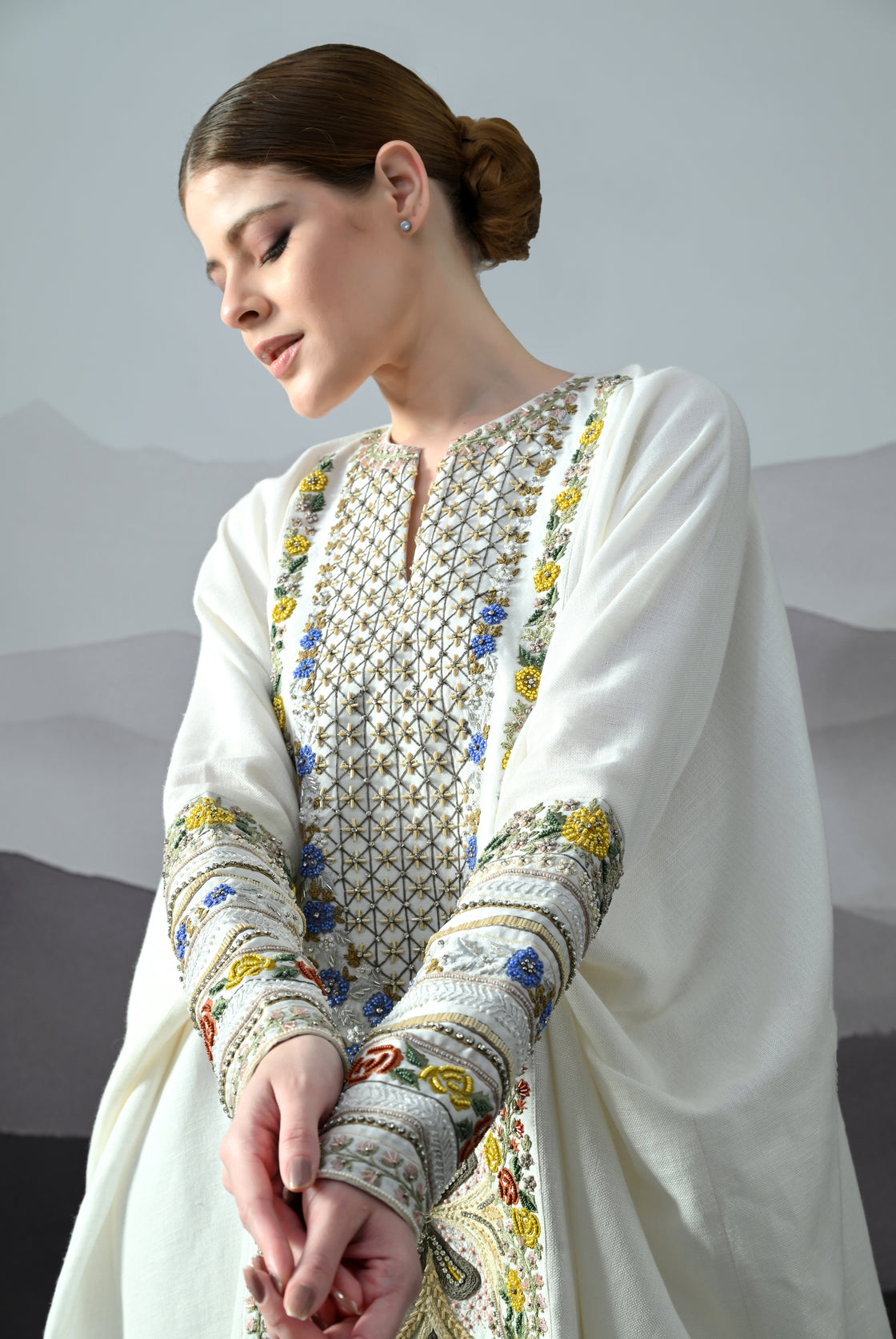 Ivory Kaftan with Hand-Embroidered Floral Work and Geometric Borders