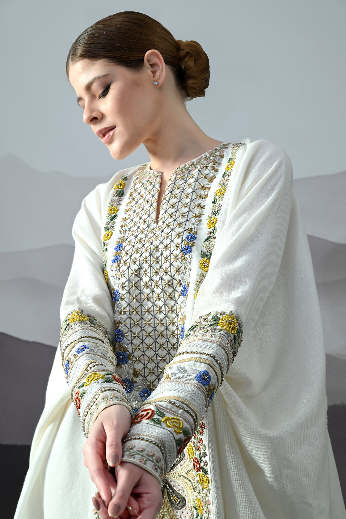 Ivory Kaftan With Hand-Embroidered Floral Work And Geometric Borders