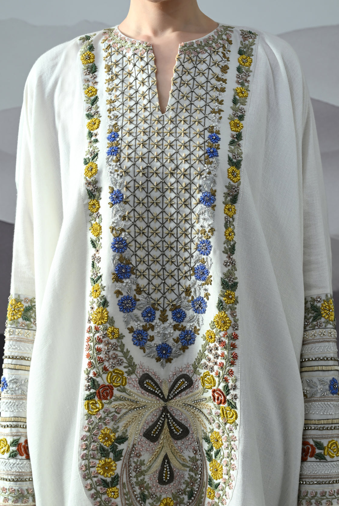 Ivory Kaftan with Hand-Embroidered Floral Work and Geometric Borders