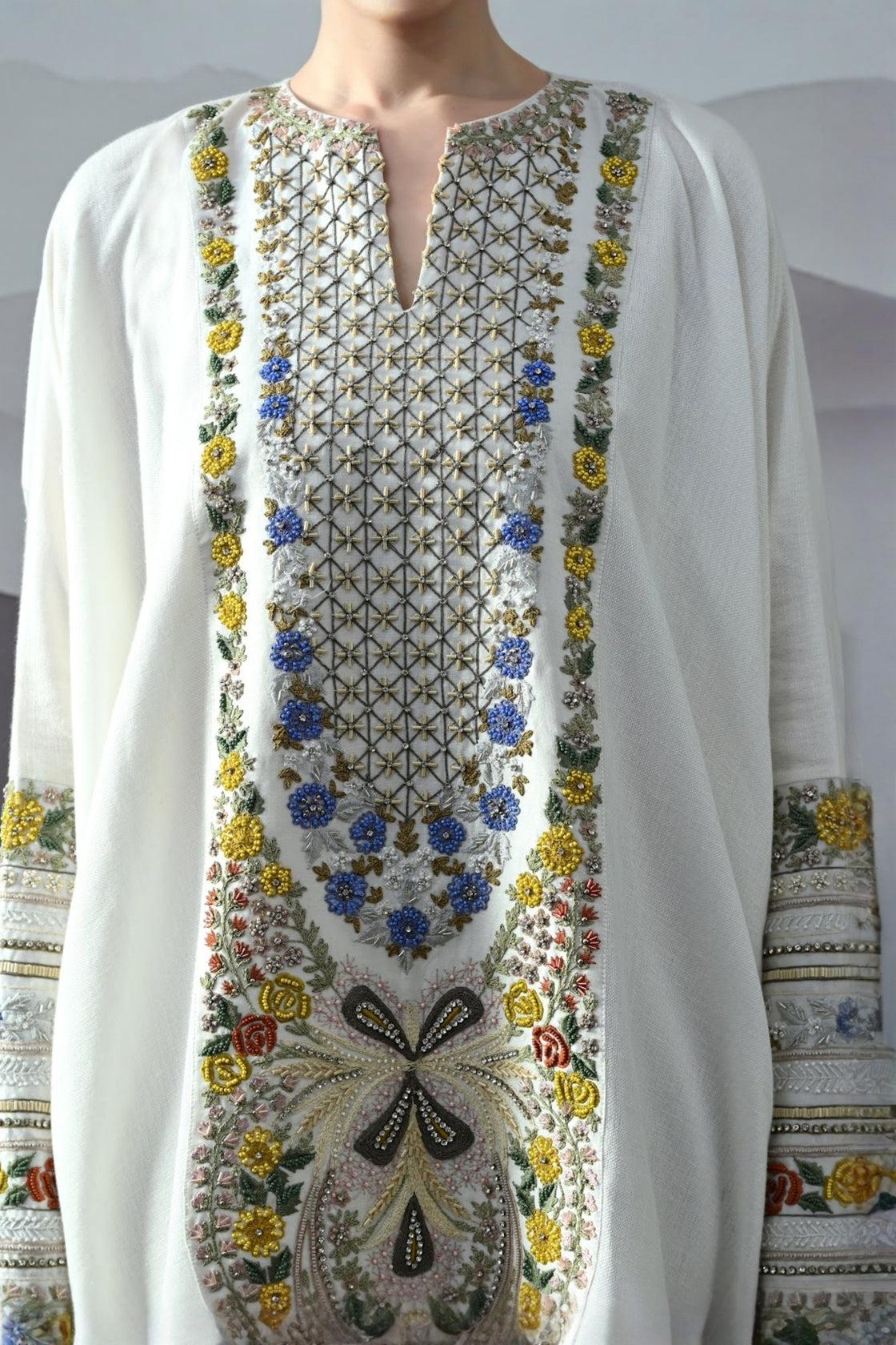 Ivory Kaftan With Hand-Embroidered Floral Work And Geometric Borders