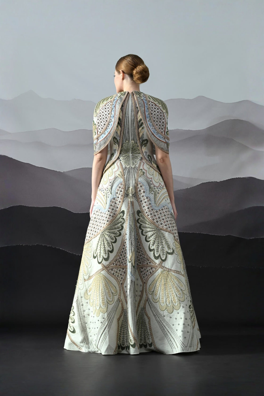 Ivory Silhouette With Artisanal Handwork And Layered Construction
