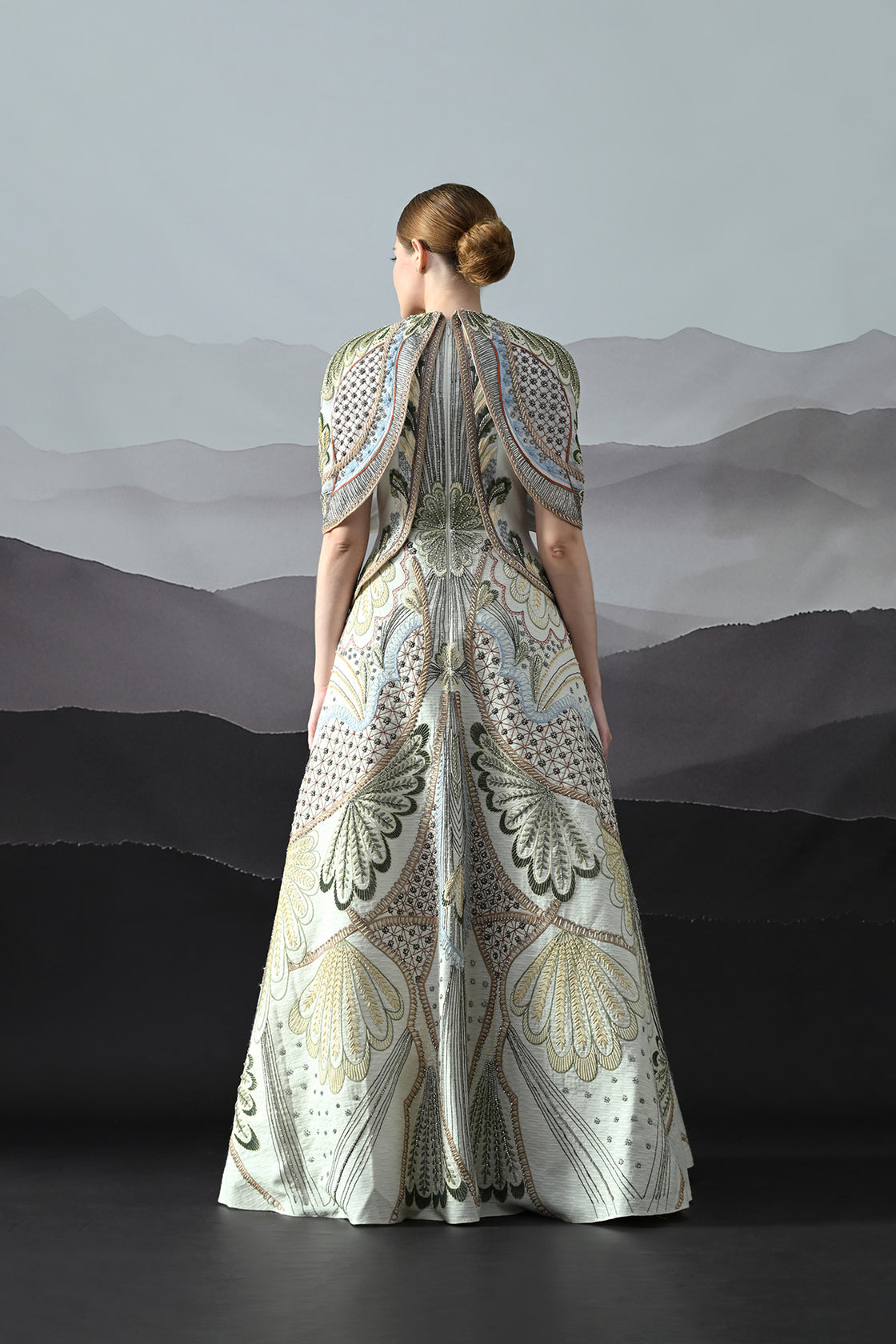 Ivory Silhouette With Artisanal Handwork And Layered Construction