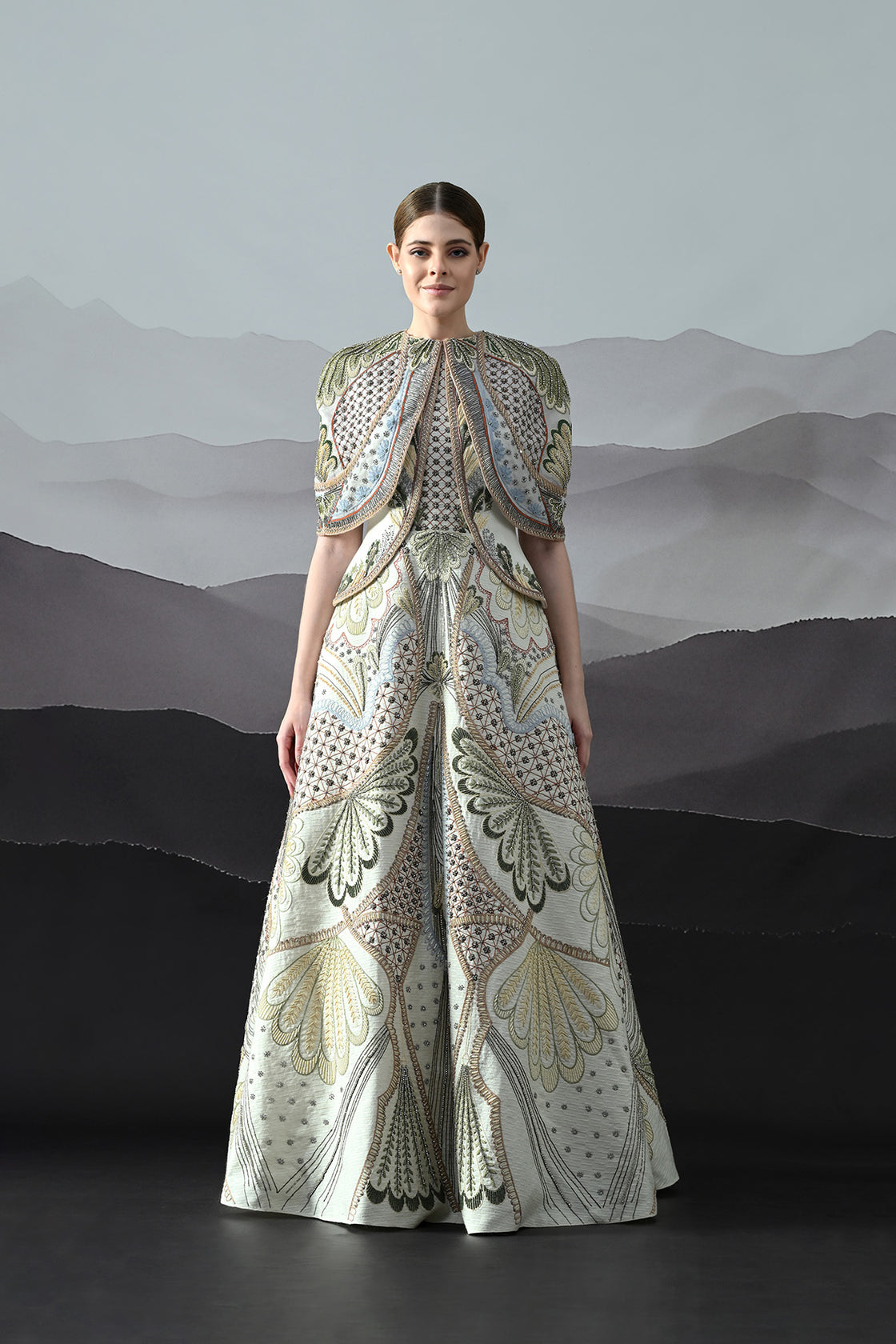 Ivory Silhouette With Artisanal Handwork And Layered Construction