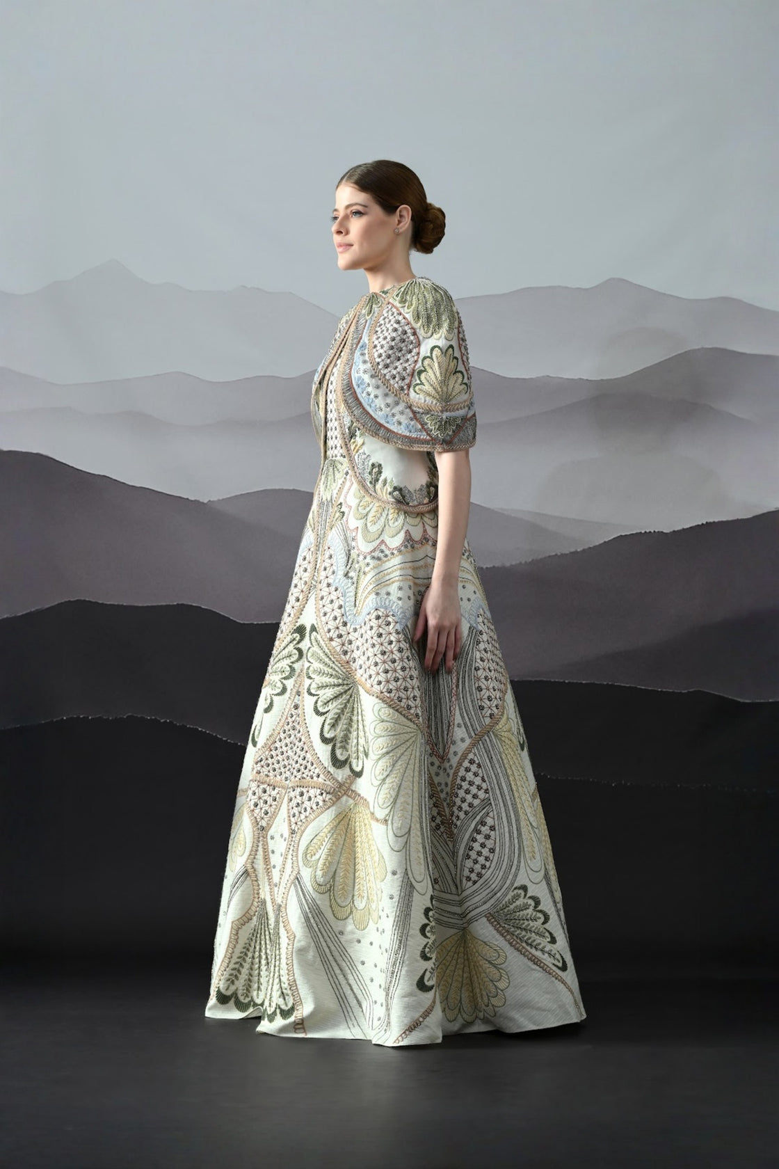 Ivory Silhouette With Artisanal Handwork And Layered Construction
