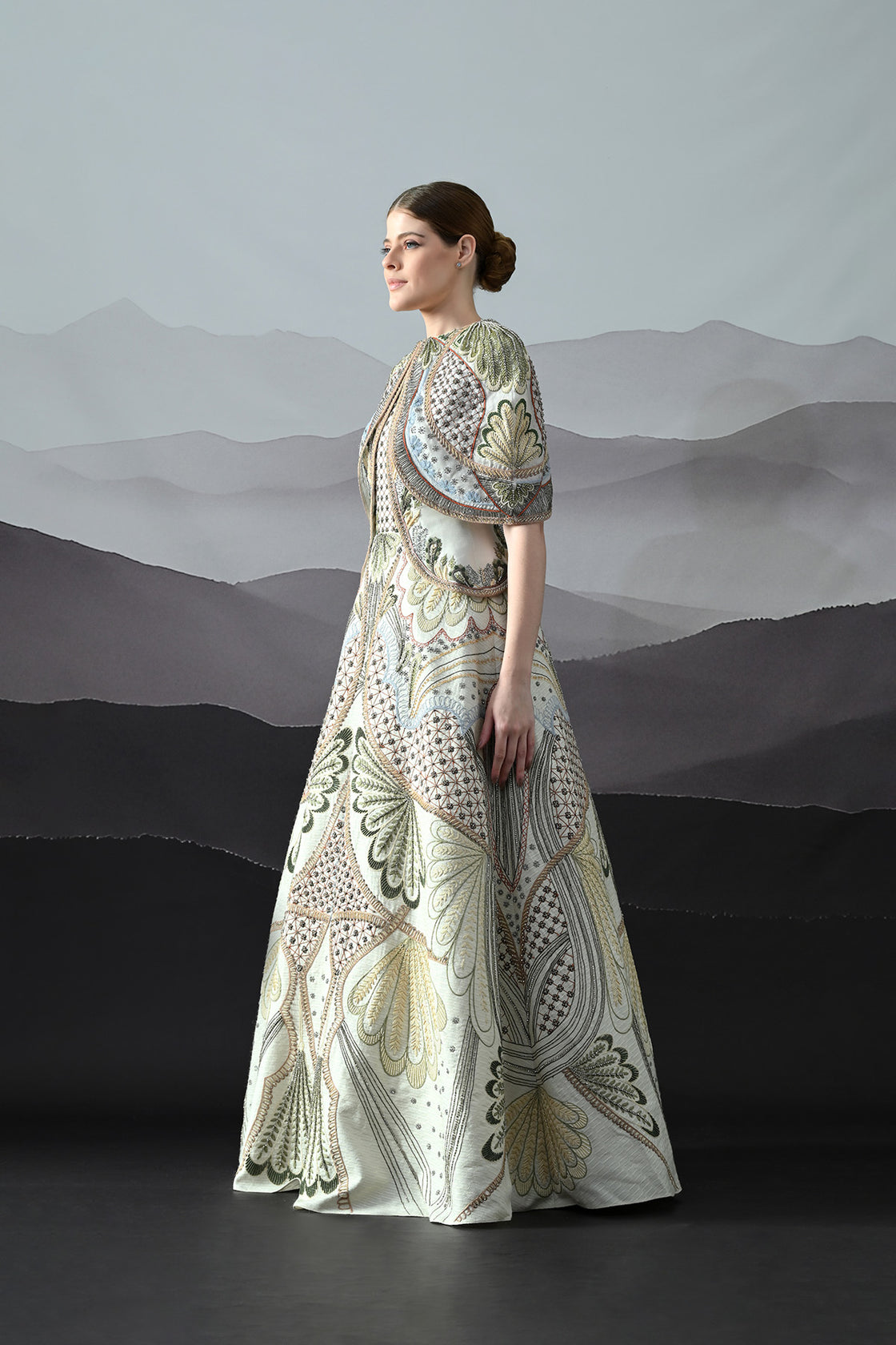 Ivory Silhouette With Artisanal Handwork And Layered Construction