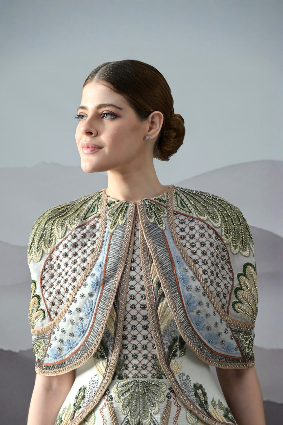 Ivory Silhouette With Artisanal Handwork And Layered Construction