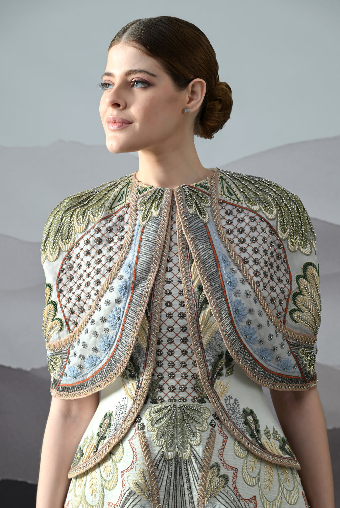 Ivory Silhouette with Artisanal Handwork and Layered Construction