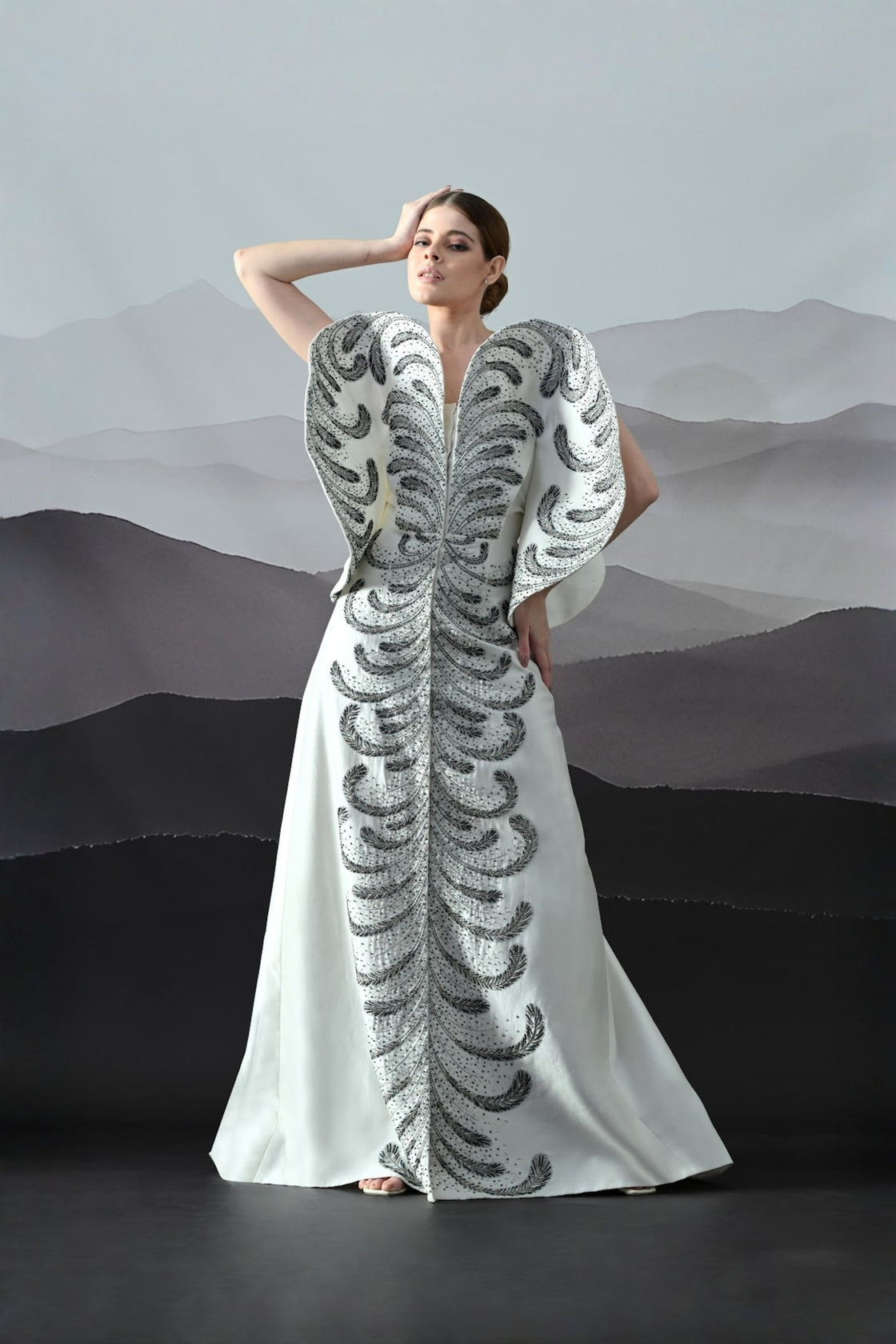 Ivory Gown With Hand-Embroidered Monochrome Motifs And Structured Silhouette