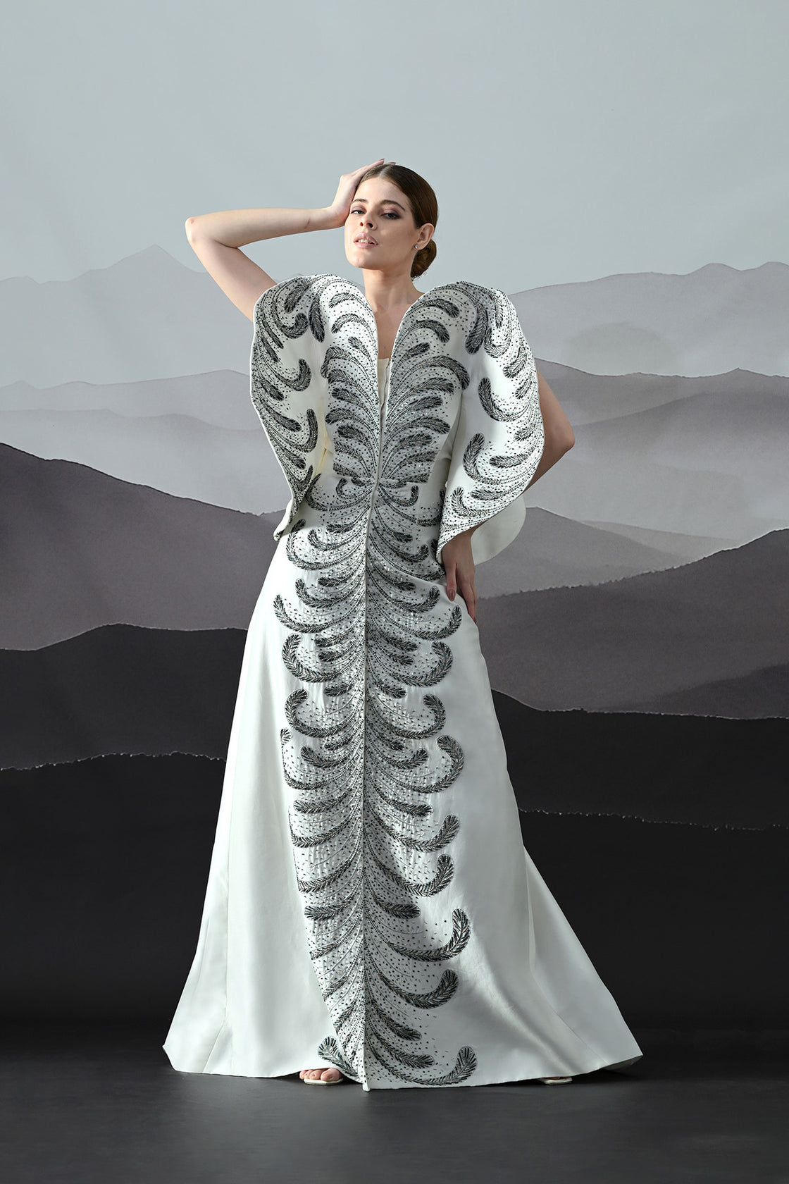Ivory Gown With Hand-Embroidered Monochrome Motifs And Structured Silhouette