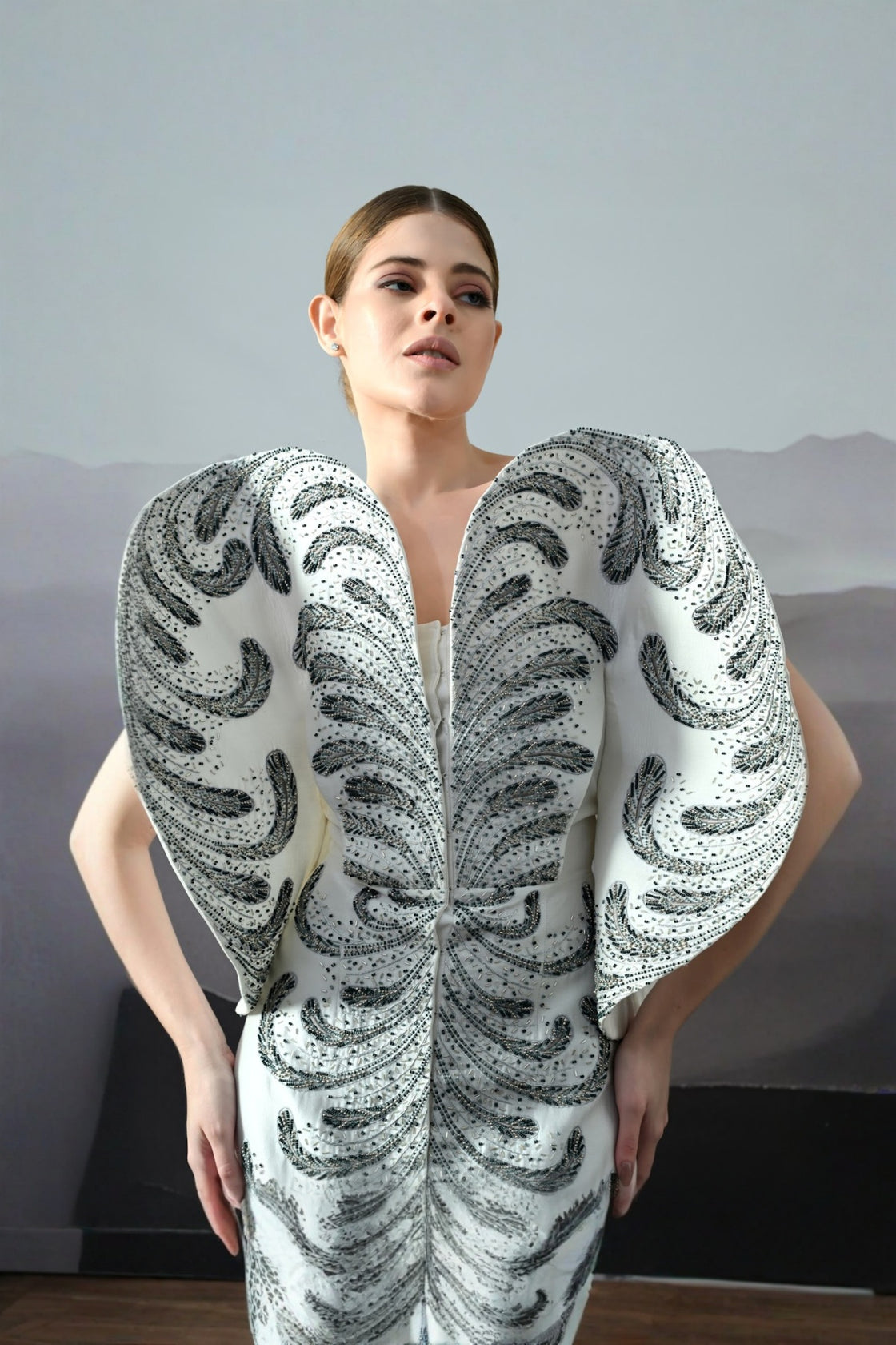Ivory Gown With Hand-Embroidered Monochrome Motifs And Structured Silhouette