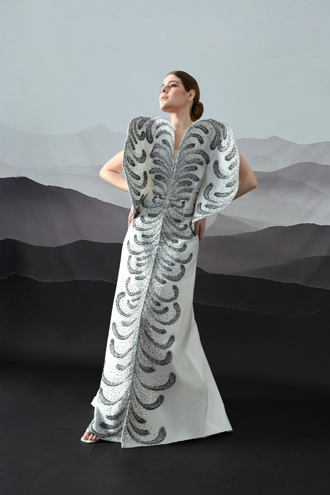 Ivory Gown With Hand-Embroidered Monochrome Motifs And Structured Silhouette