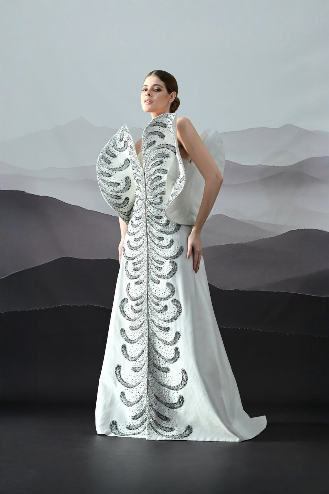 Ivory Gown With Hand-Embroidered Monochrome Motifs And Structured Silhouette
