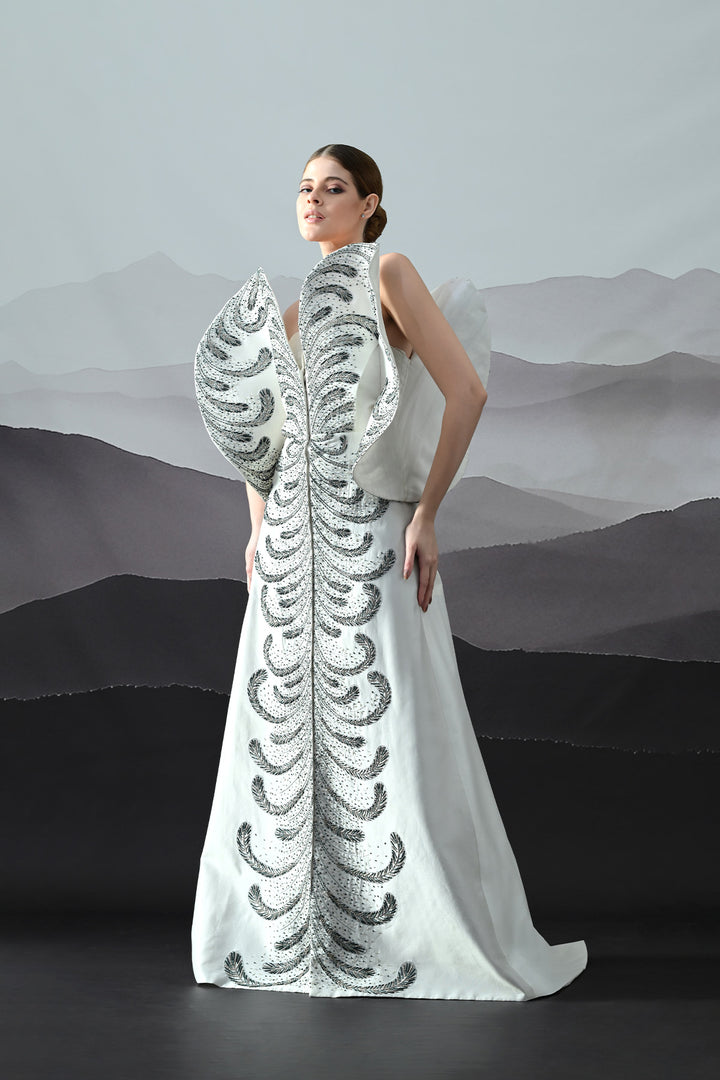 Ivory Gown With Hand-Embroidered Monochrome Motifs And Structured Silhouette