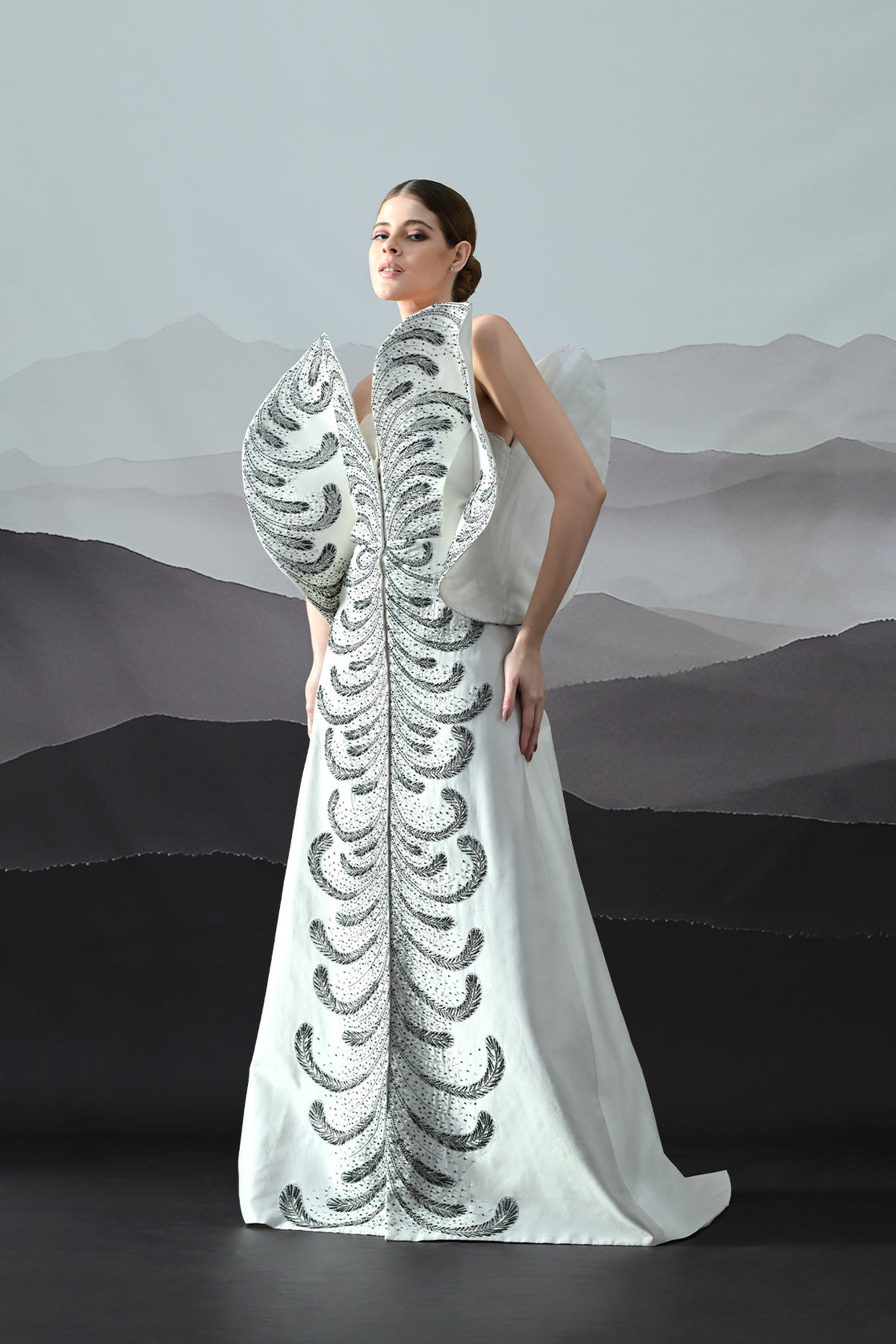 Ivory Gown With Hand-Embroidered Monochrome Motifs And Structured Silhouette