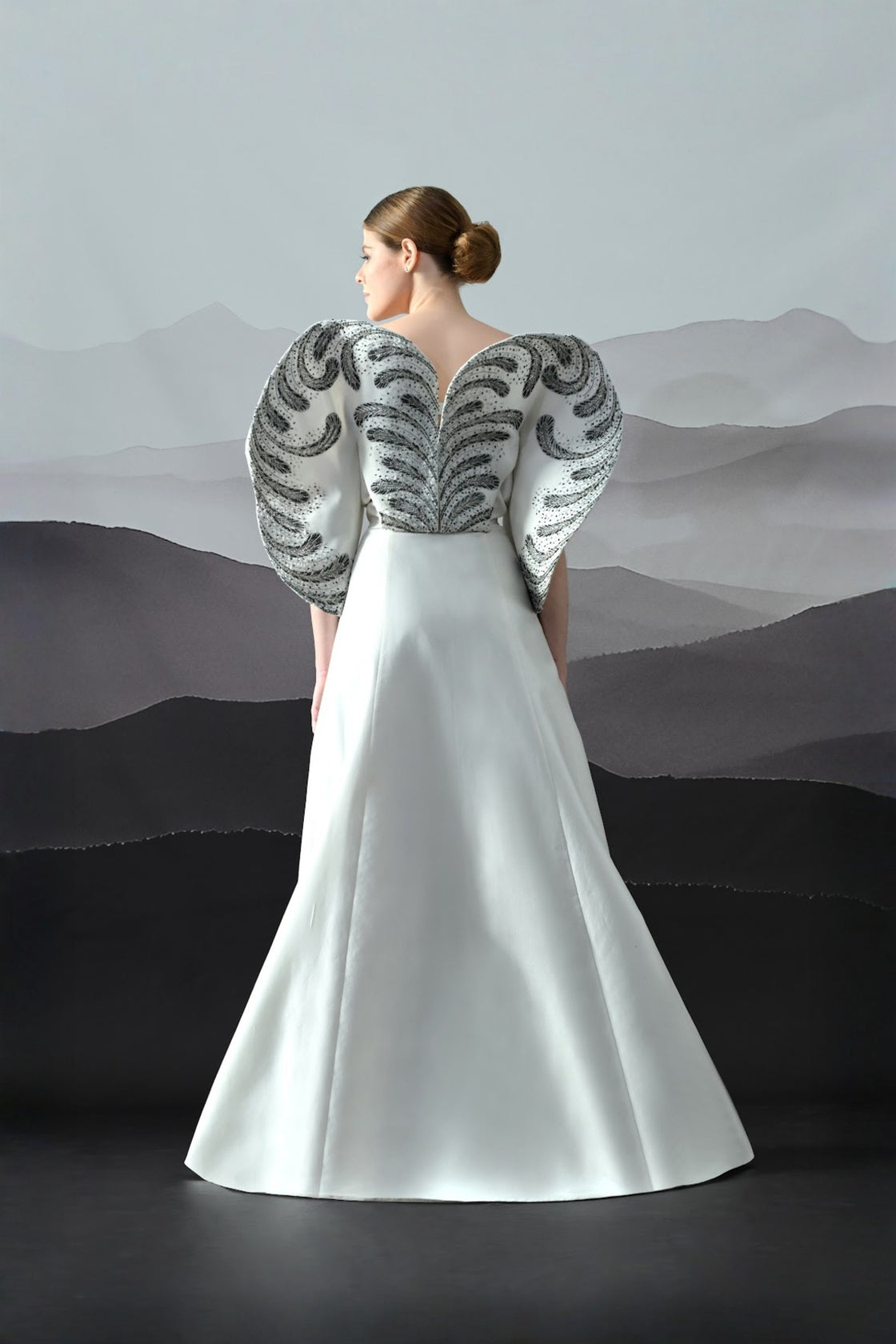 Ivory Gown With Hand-Embroidered Monochrome Motifs And Structured Silhouette