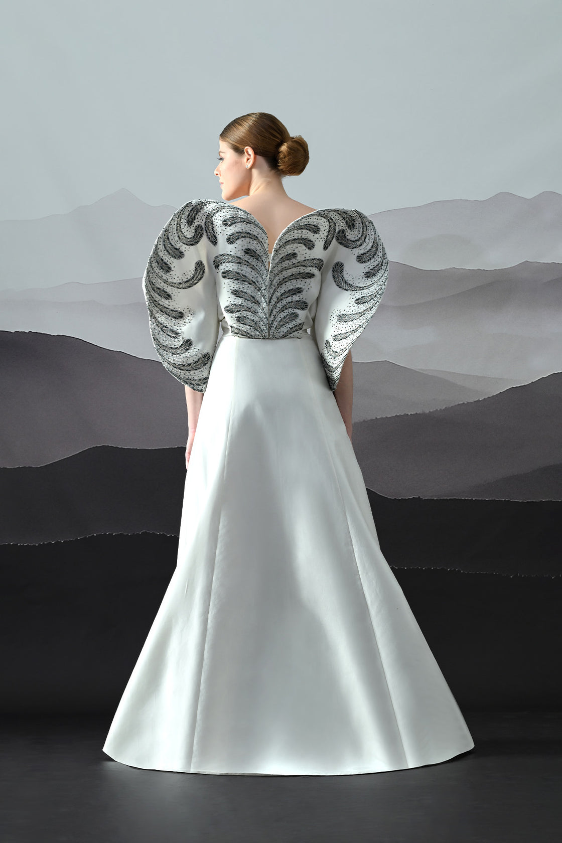 Ivory Gown With Hand-Embroidered Monochrome Motifs And Structured Silhouette