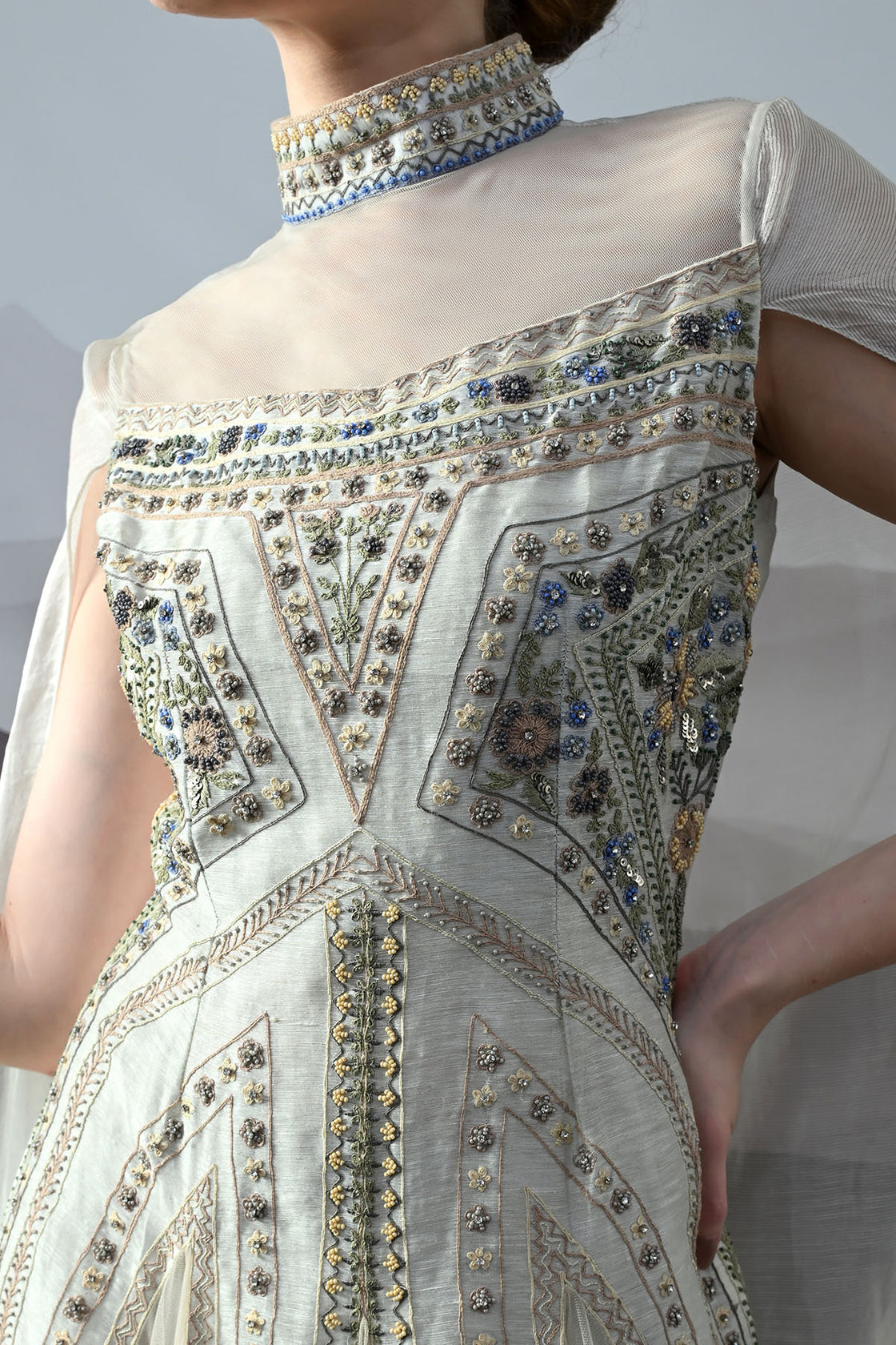 Ivory High Neck Gown With Handworked Panelled Embroidery