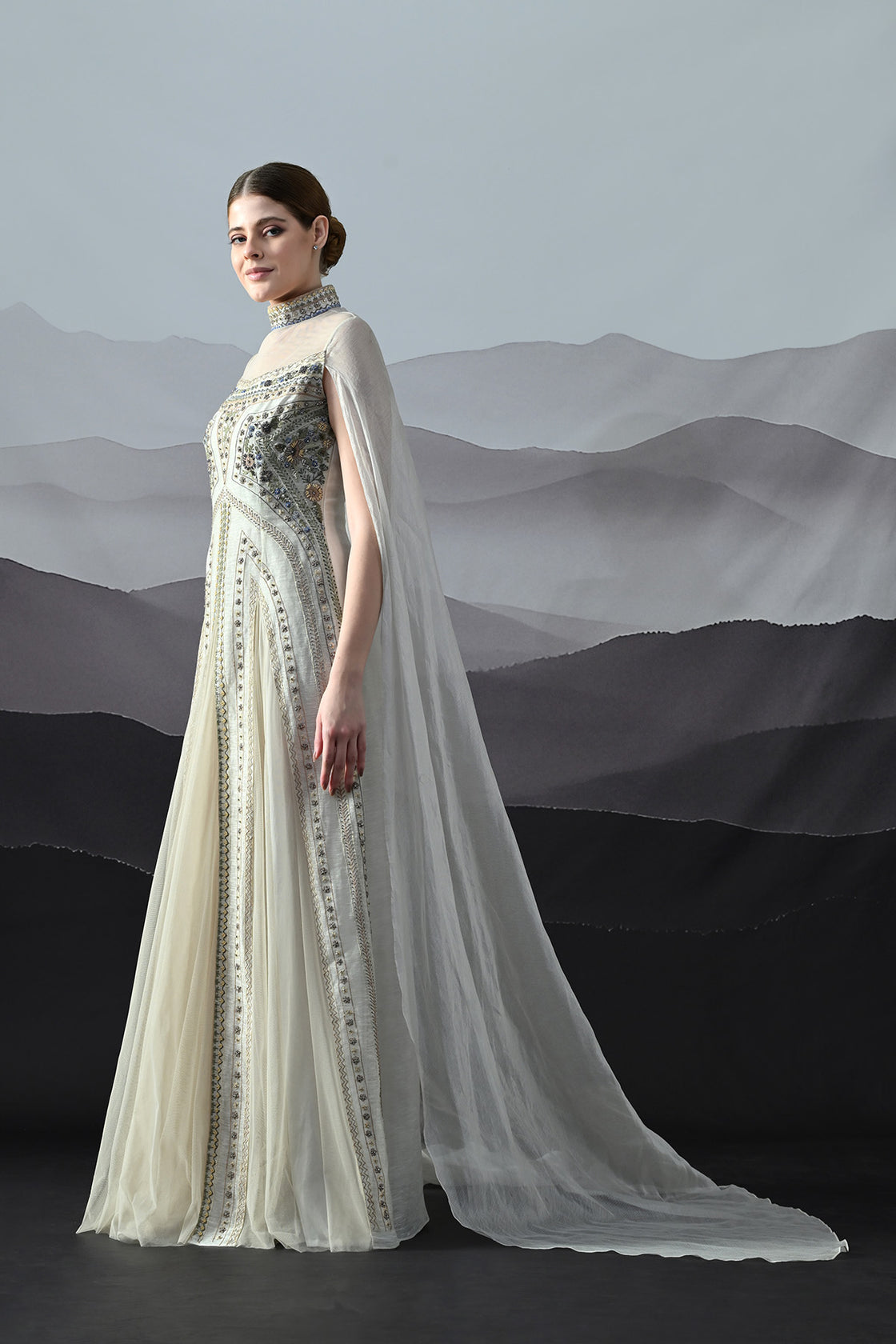 Ivory High Neck Gown With Handworked Panelled Embroidery