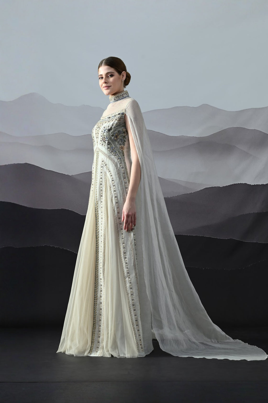 Ivory High Neck Gown With Handworked Panelled Embroidery