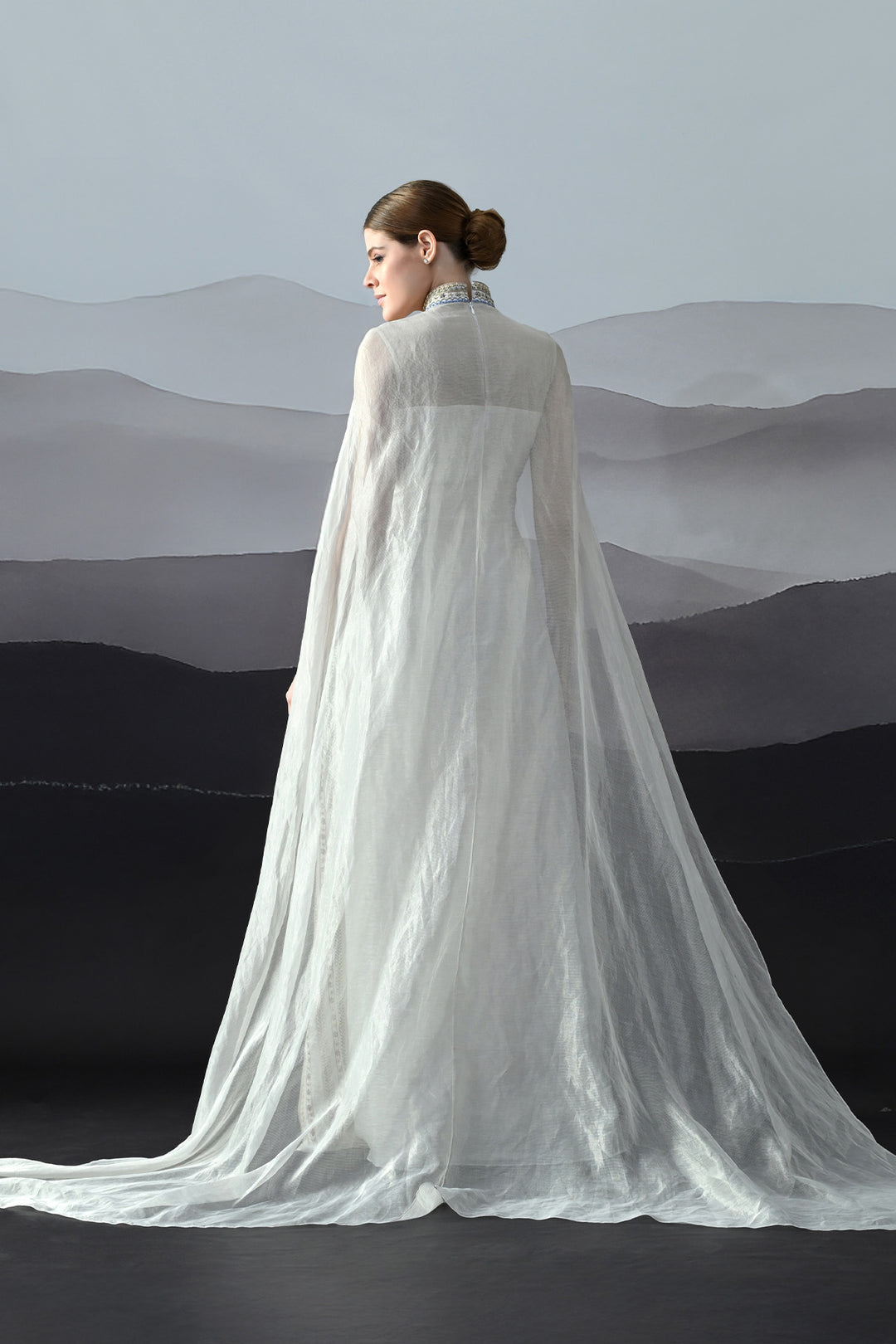Ivory High Neck Gown With Handworked Panelled Embroidery