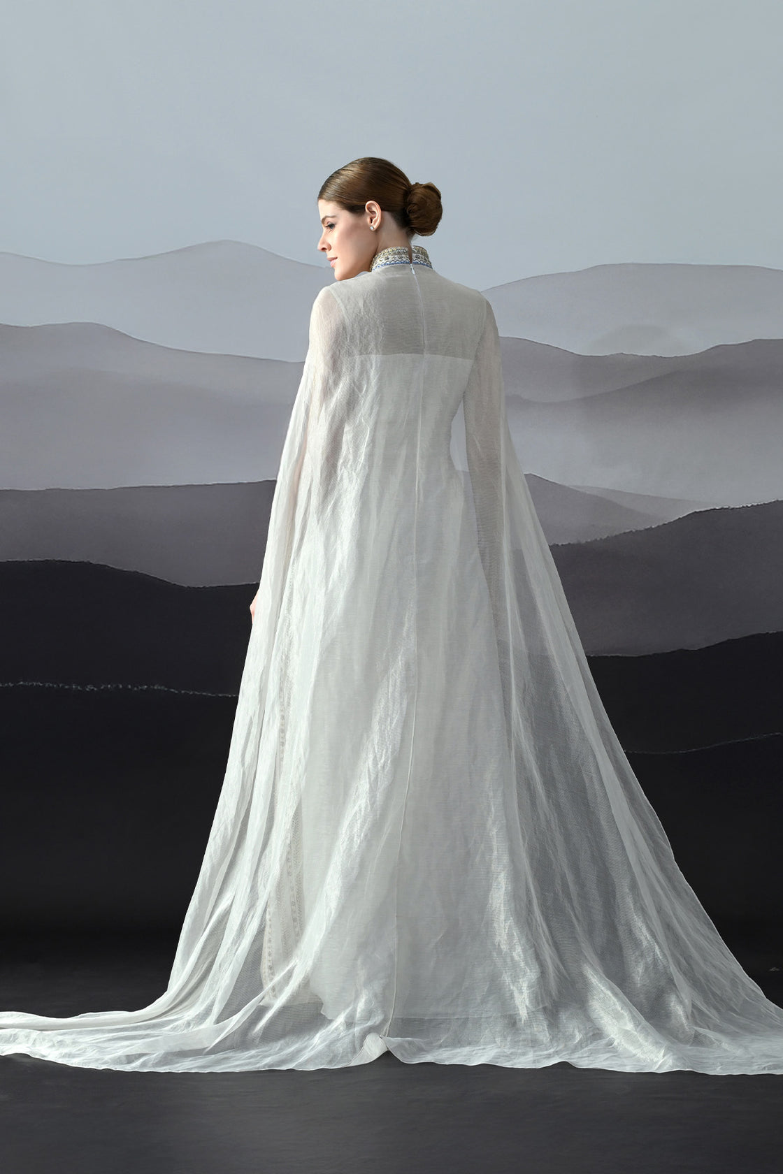 Ivory High Neck Gown With Handworked Panelled Embroidery