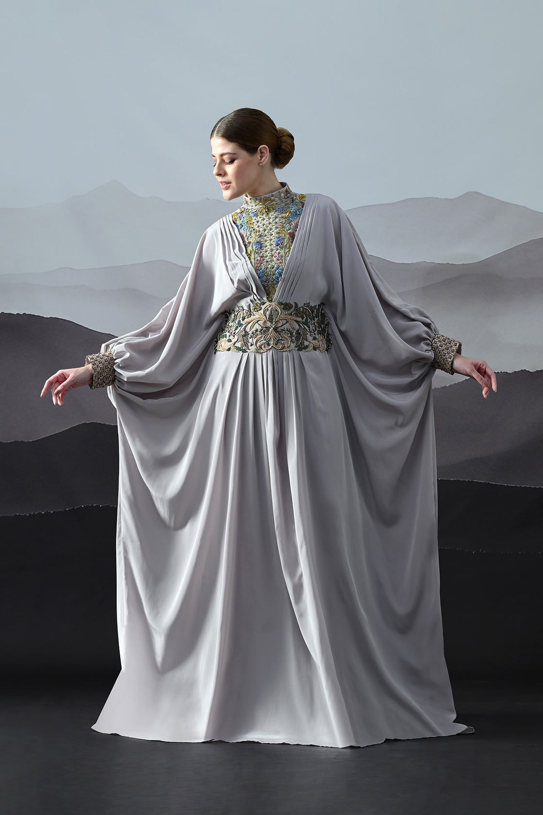 Soft Grey Draped Gown With Hand-Embroidered High Neck And Floral Waist Detail