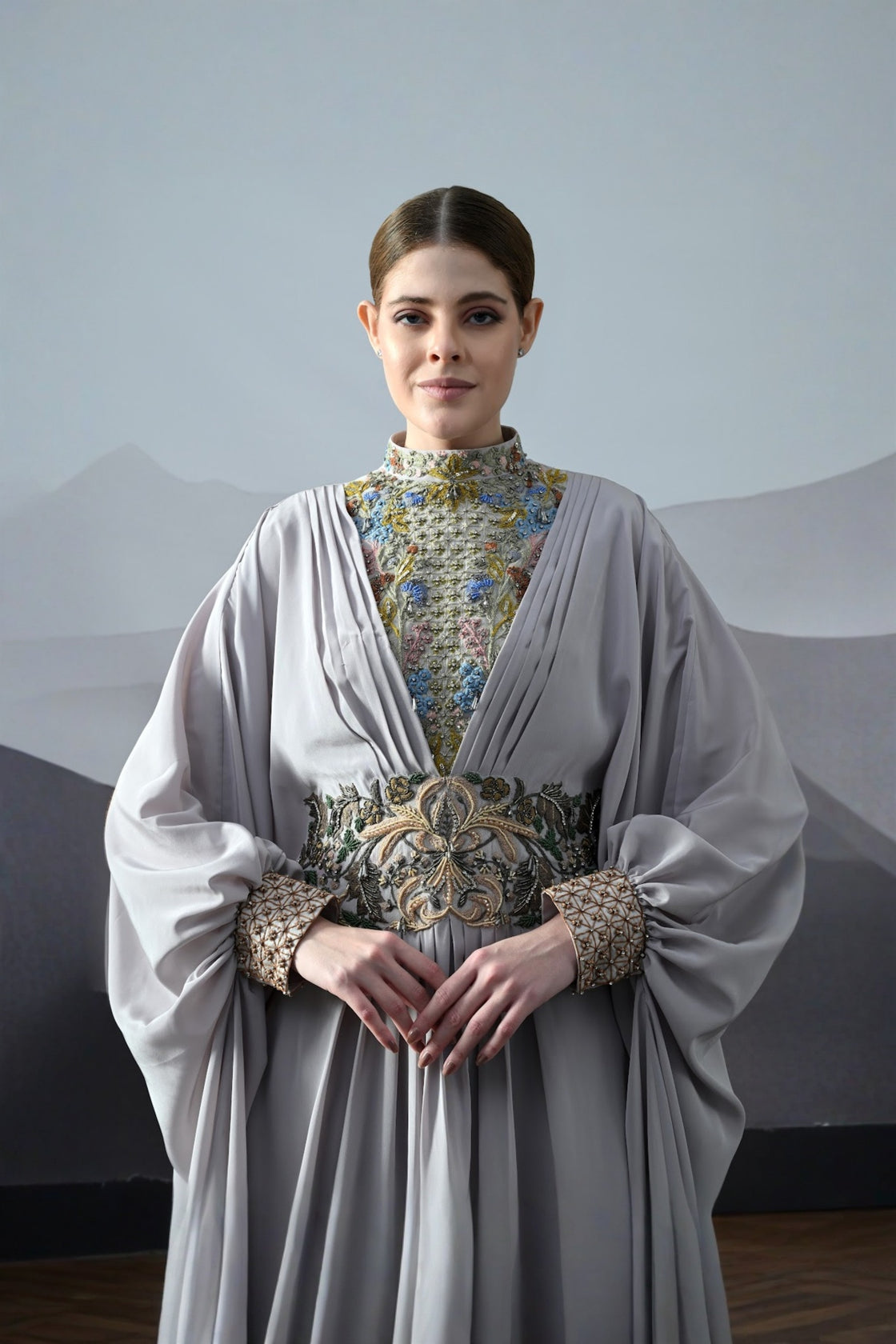 Soft Grey Draped Gown With Hand-Embroidered High Neck And Floral Waist Detail