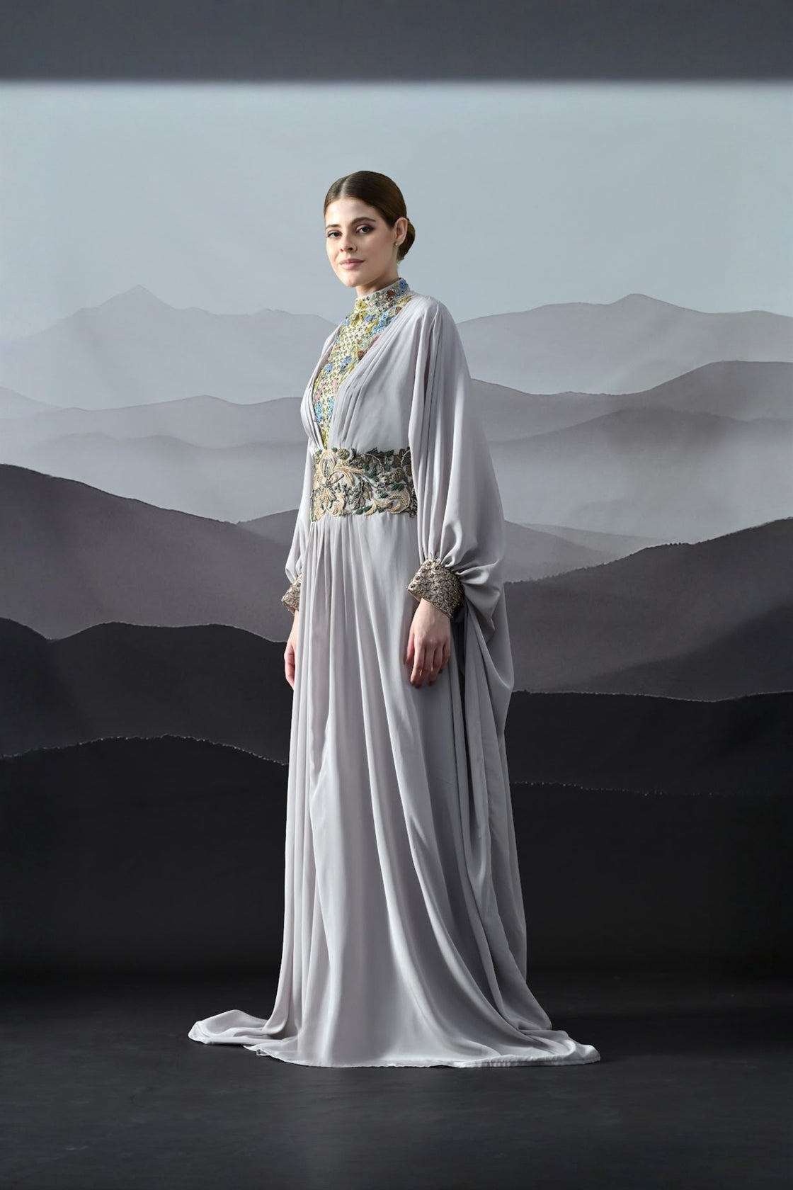 Soft Grey Draped Gown With Hand-Embroidered High Neck And Floral Waist Detail