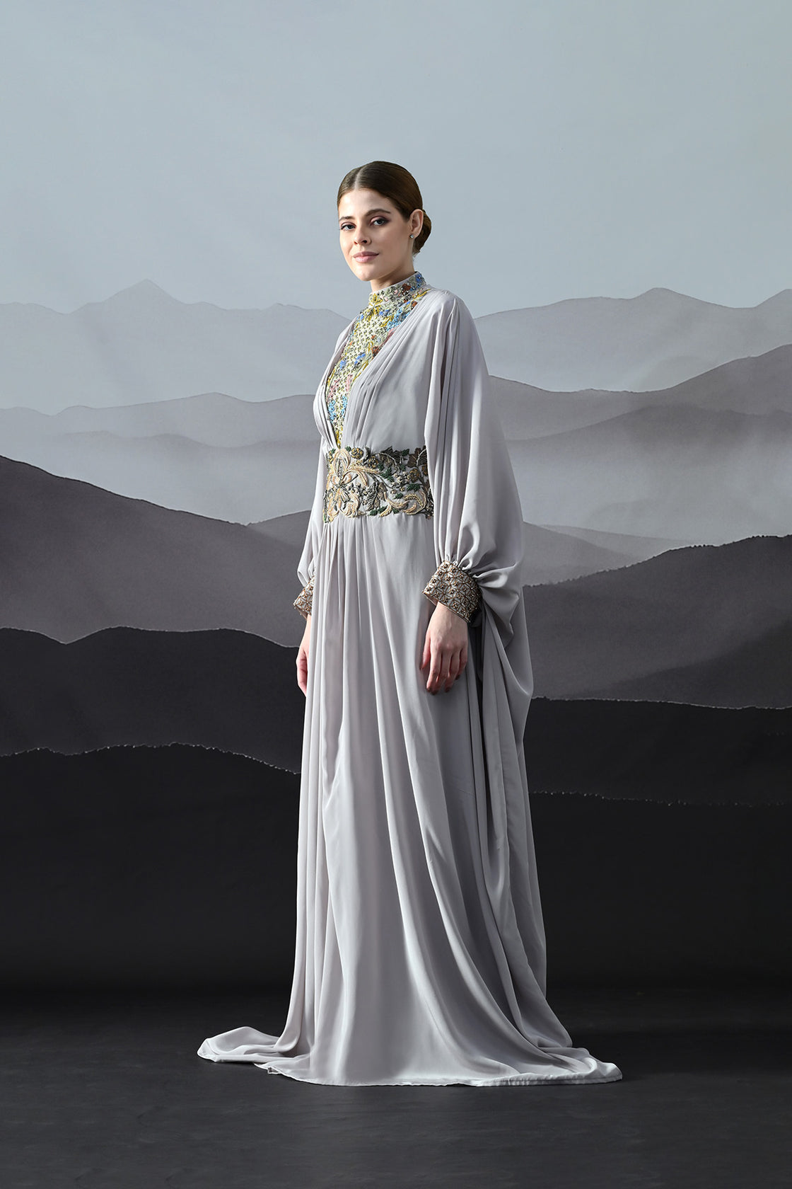 Soft Grey Draped Gown With Hand-Embroidered High Neck And Floral Waist Detail