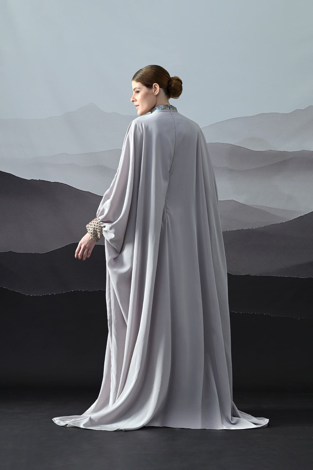 Soft Grey Draped Gown With Hand-Embroidered High Neck And Floral Waist Detail