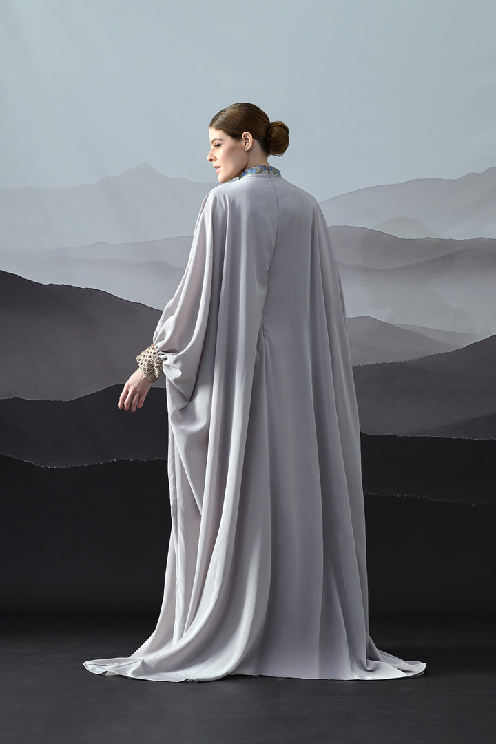 Soft Grey Draped Gown With Hand-Embroidered High Neck And Floral Waist Detail