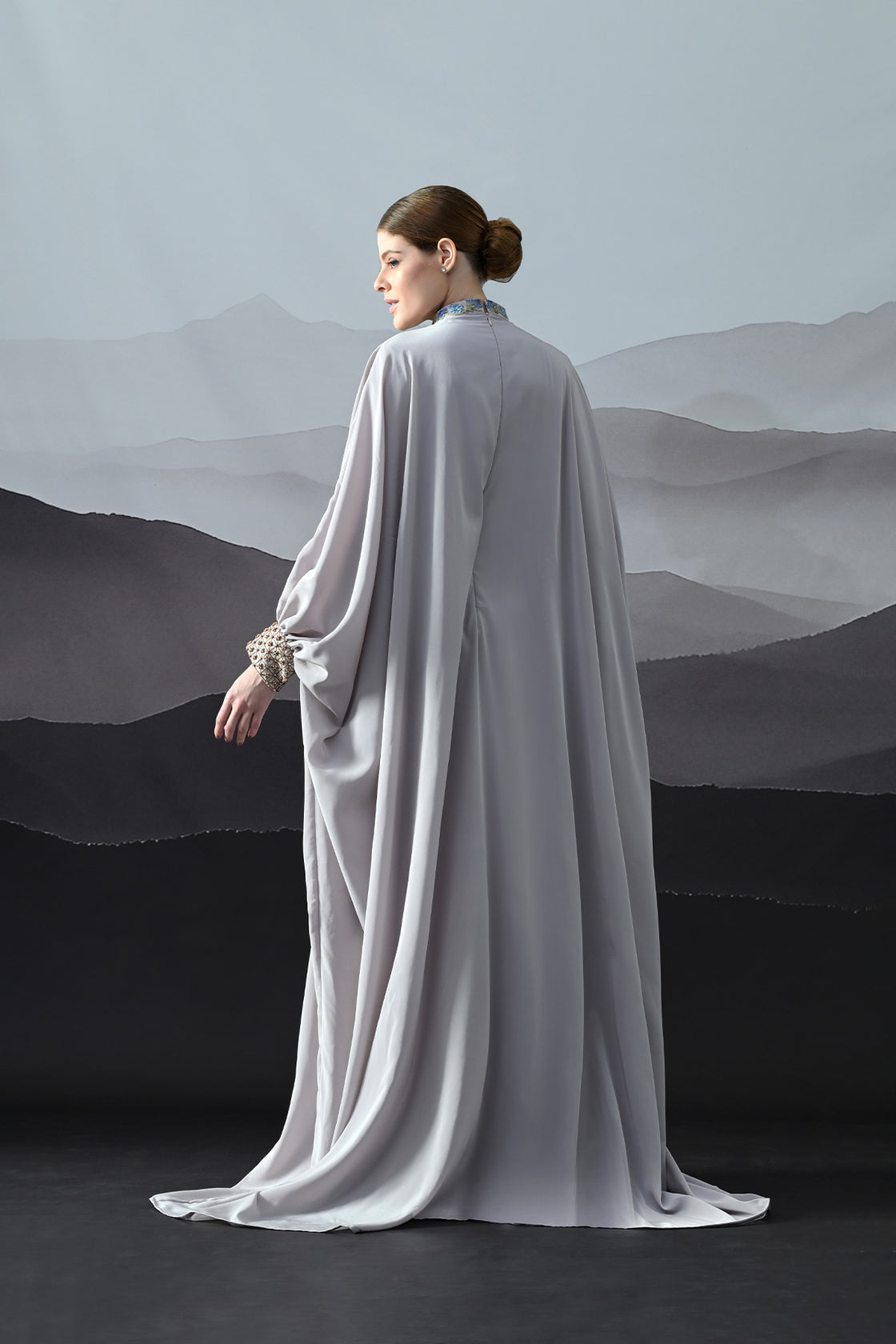 Soft Grey Draped Gown With Hand-Embroidered High Neck And Floral Waist Detail
