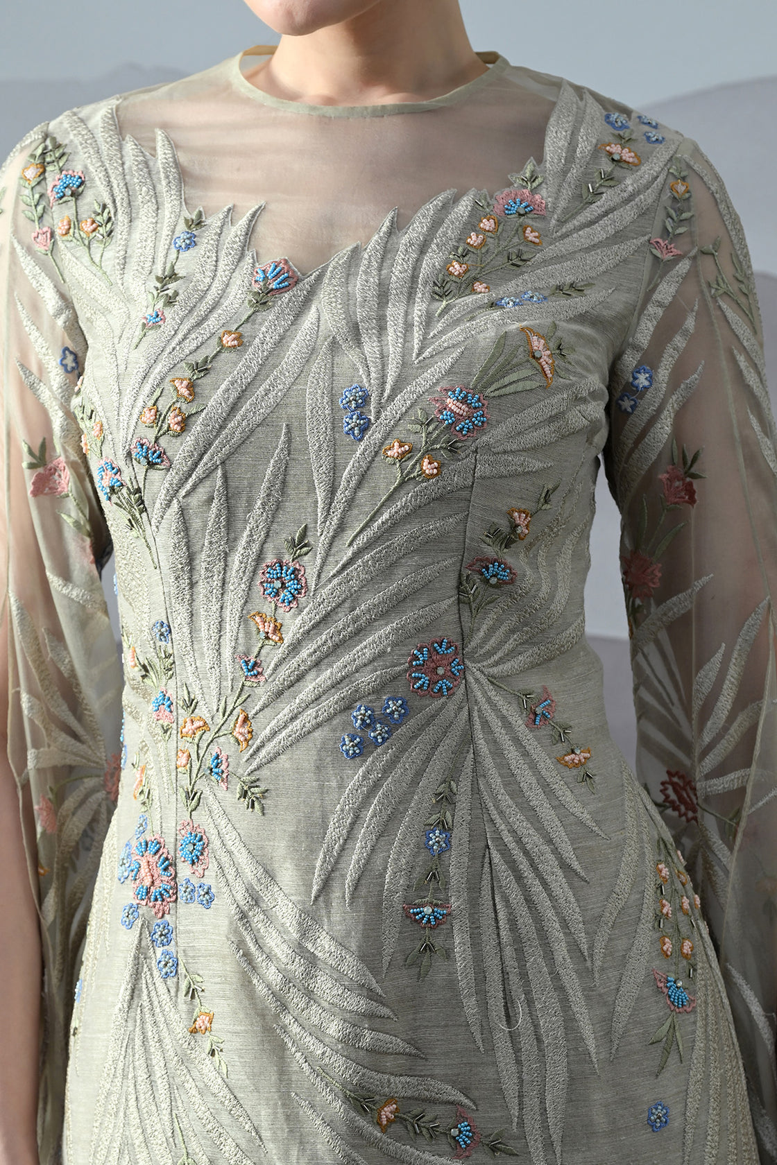 Soft Grey Gown With Handworked Floral Trails, And Sheer Overlay