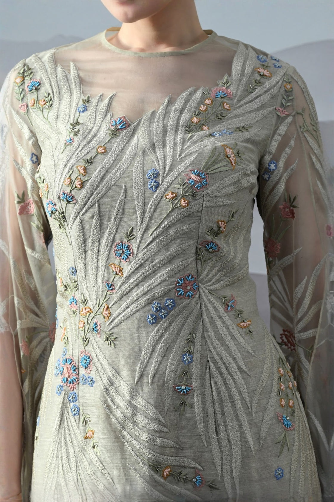 Soft Grey Gown With Handworked Floral Trails, And Sheer Overlay